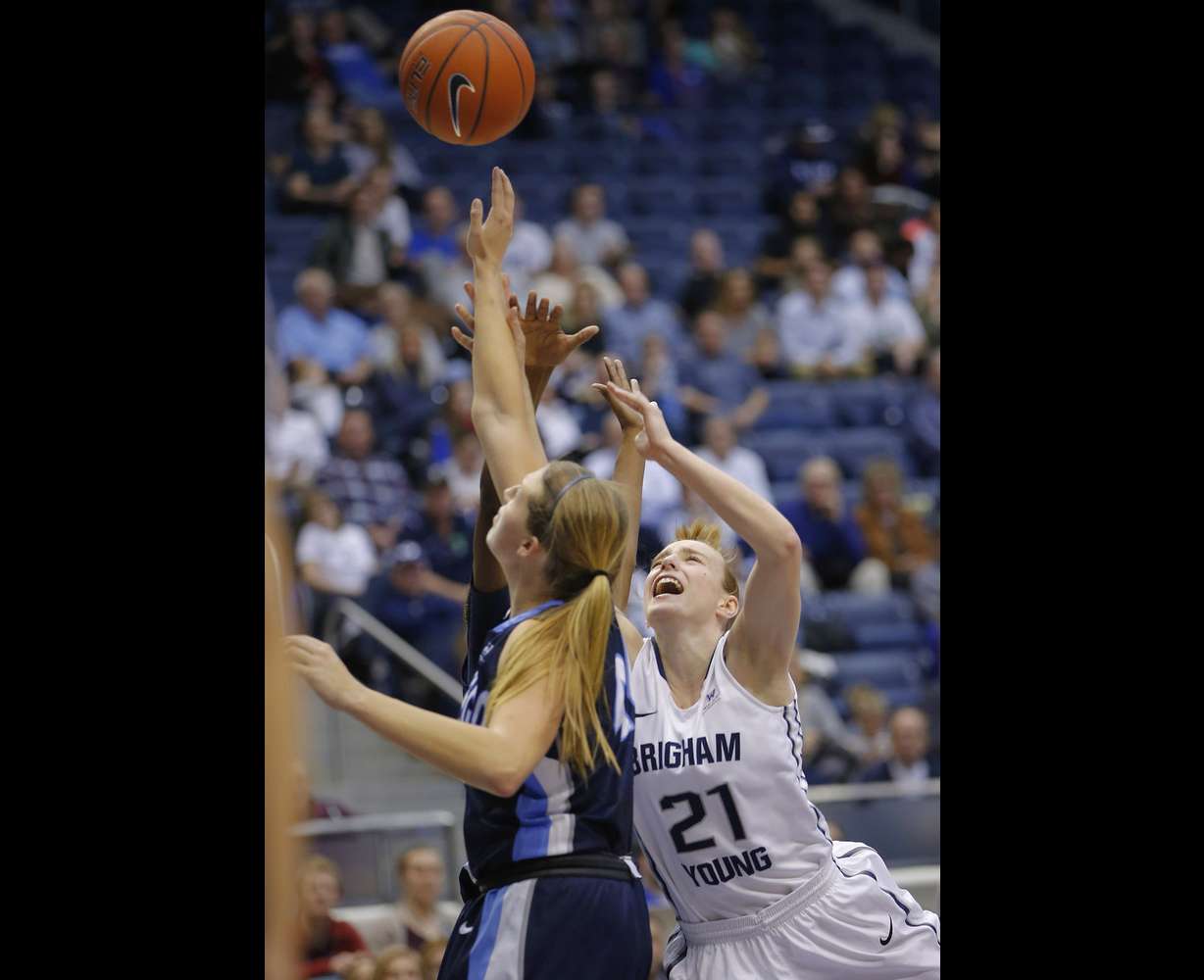 BYU guard Lexi Eaton Rydalch (21) scores over San Diego forward Sydney Williams (44) in Provo, Feb. 18, 2016. BYU opens the West Coast Conference Tournament as the top seed Friday. (Photo: Jeffrey D. Allred, Deseret News)