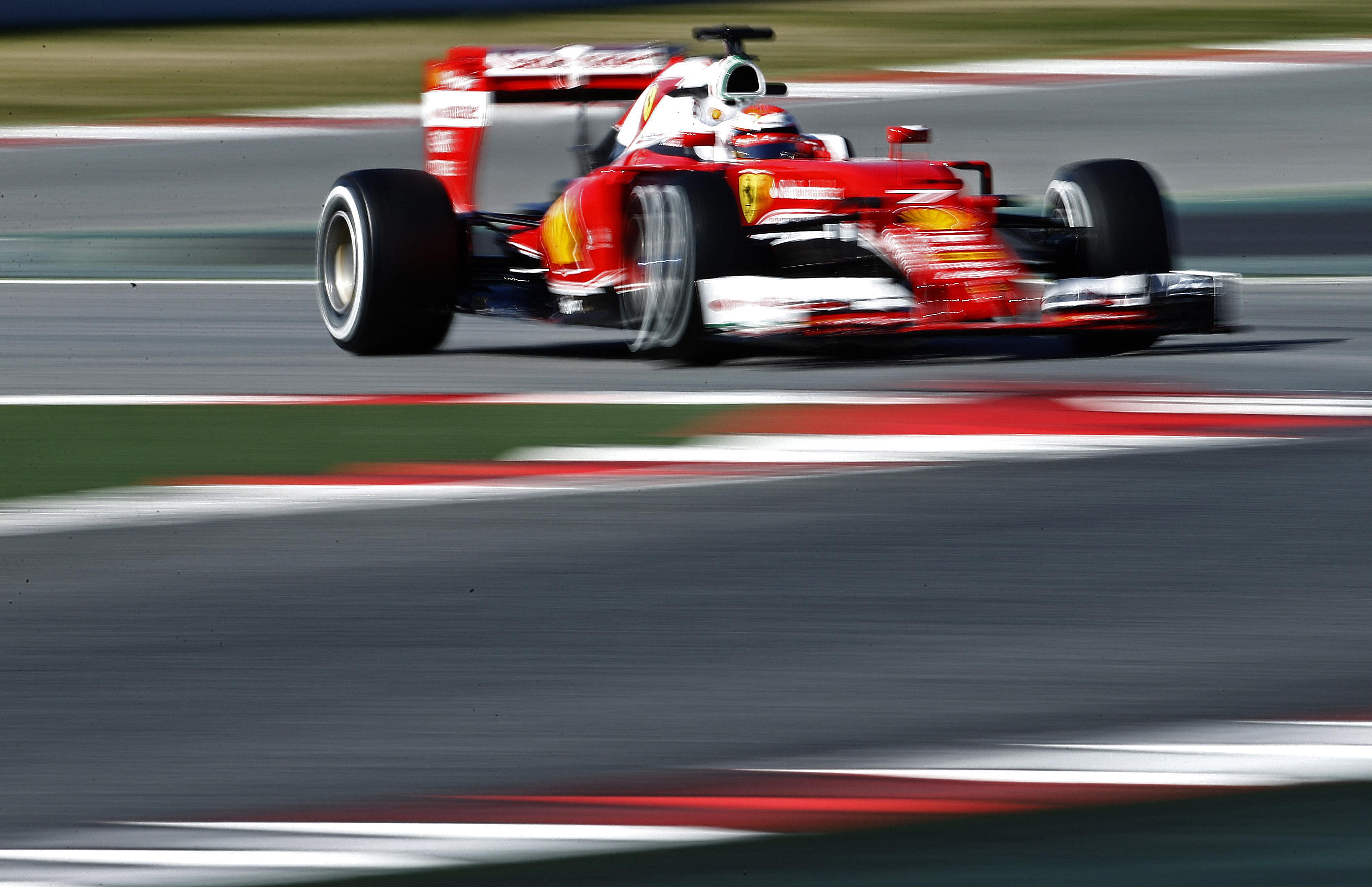Ferrari driver Kimi Raikkonen tries out halo in F1 testing