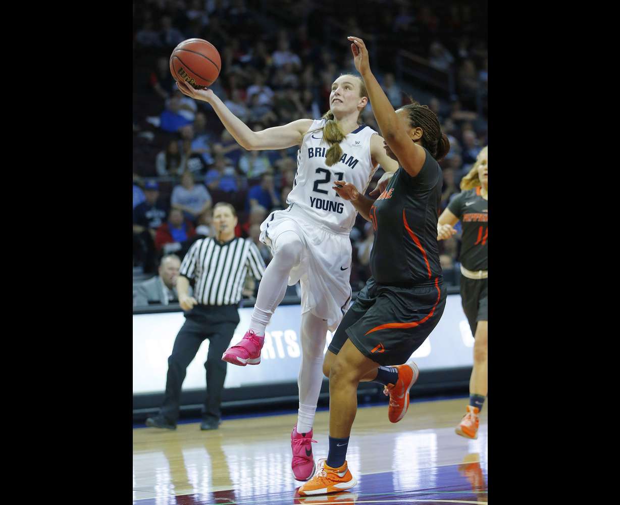 BYU guard Lexi Eaton Rydalch (21) drives on Pepperdine guard/forward Keitra Wallace (51) during the WCC Tournament in Las Vegas Friday, March 4, 2016. BYU won 72-59. (Photo: Jeffrey D. Allred, Deseret News)