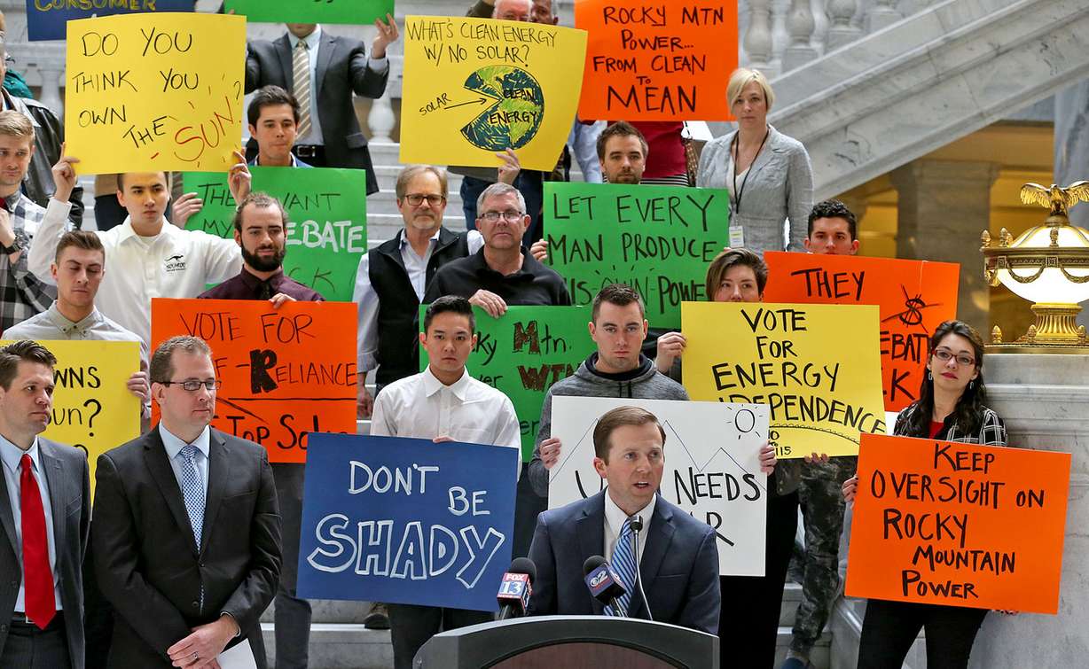 Kelly Curtis, director of operations at Solaroo Energy, speaks as solar advocates rally against SB115, which opponents say would threaten rooftop solar in Utah, at the Capitol in Salt Lake City on Friday, March 4, 2016. (Photo: Tom Smart, Deseret News)