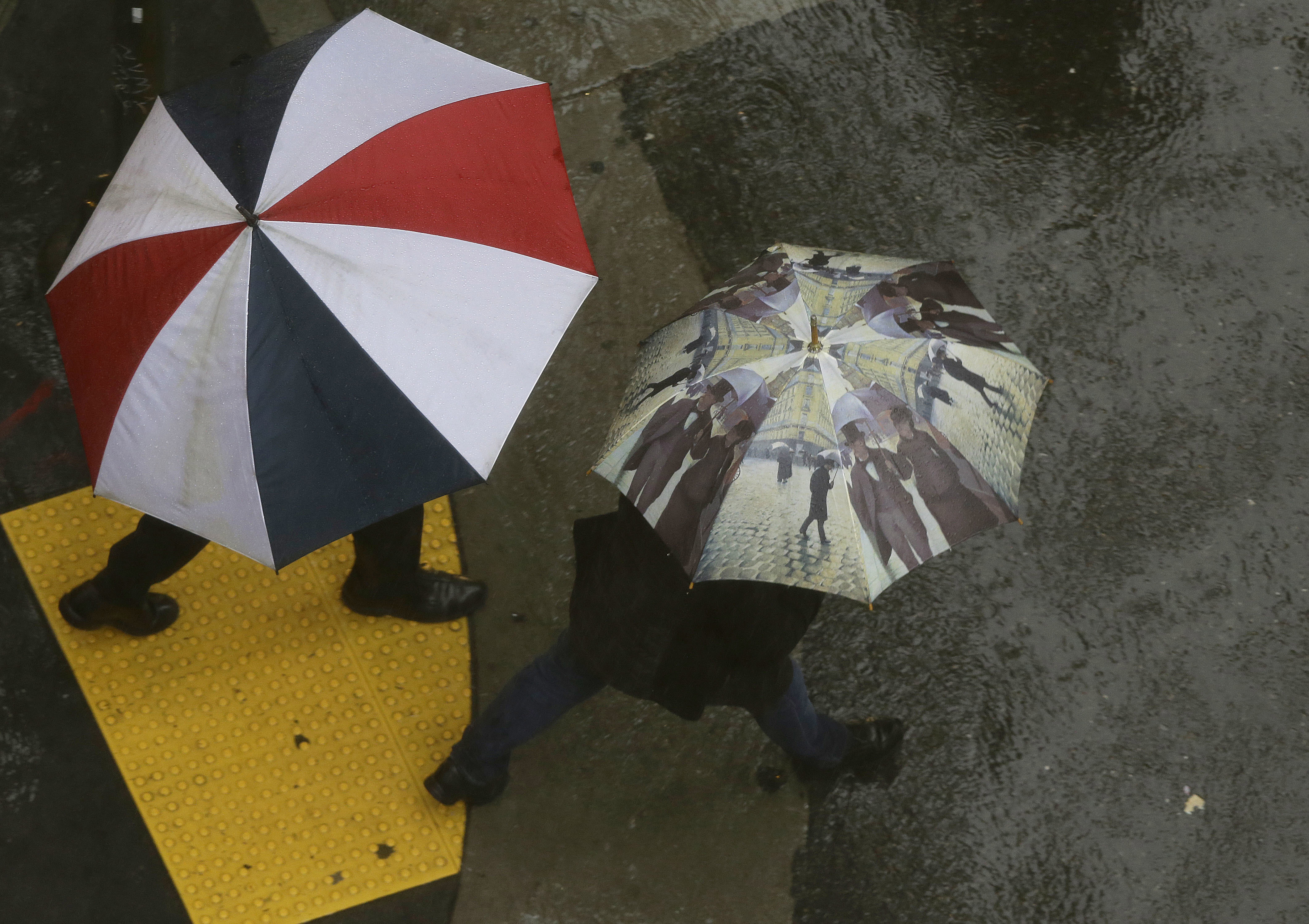 The Latest: Woman died after being trapped in submerged car