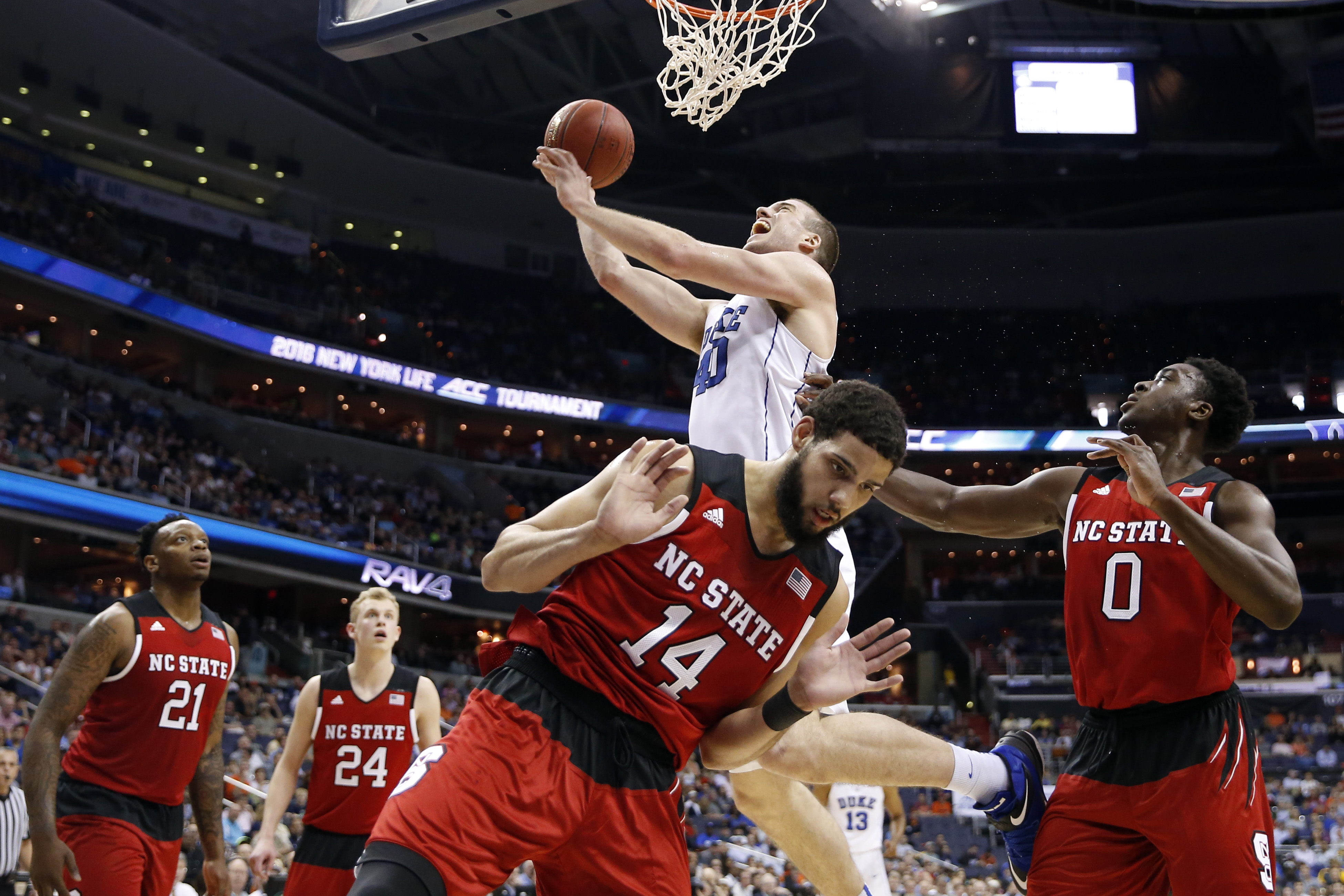 Broken nose and all, Plumlee lifts Duke past NC State 92-89