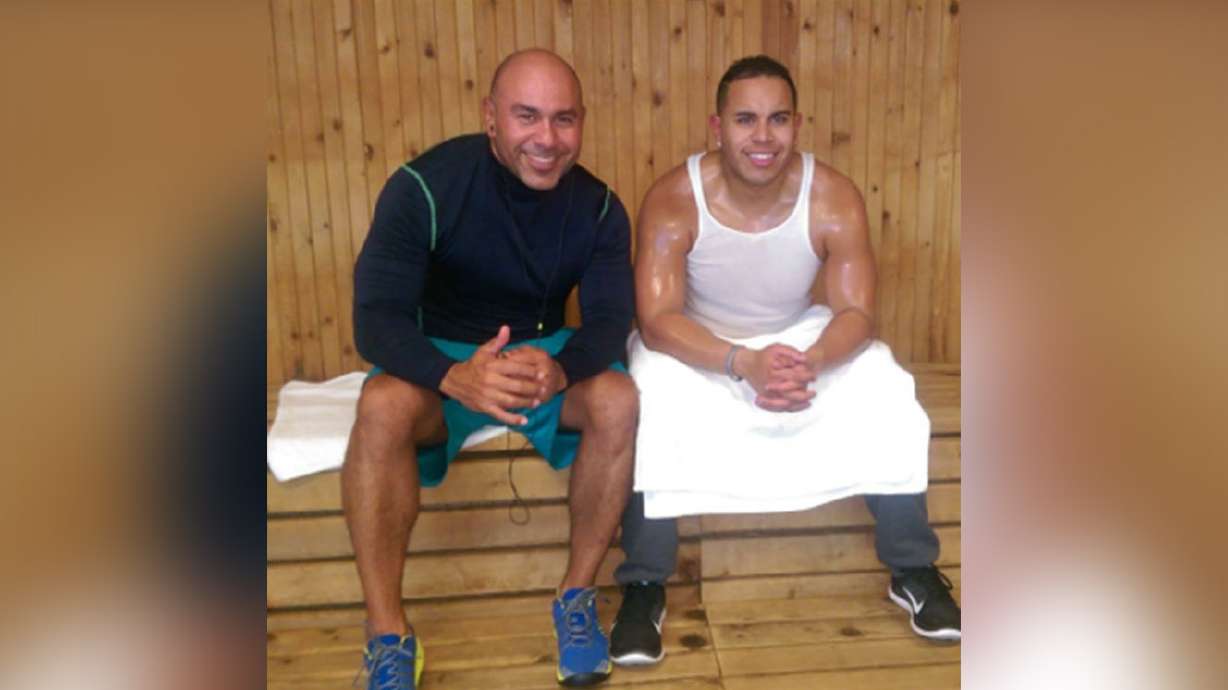 Father-son duo lose weight together, get competitive