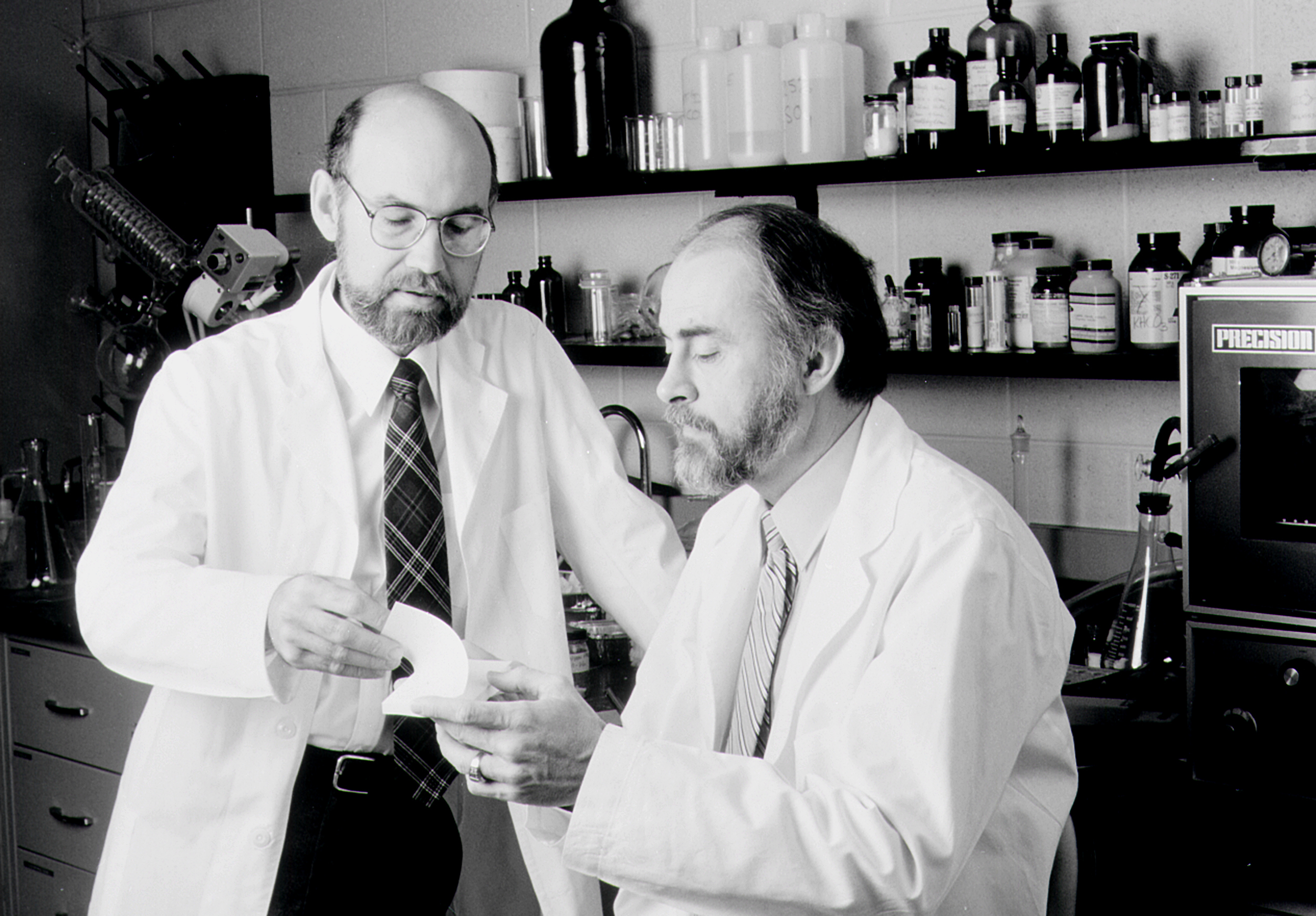This undated photo provided by 3M Corporate Communications shows Spencer Silver, left, and Art Fry, right, holding a Post-It Note pad. Alan Amron, an inventor with 40 patents, claims that he invented what he called the Press-On Memo in 1973, a year before Fry and Silver, 3M scientists, developed what later became known as the Post-It Note. Amron is suing 3M for $400 million in damages. (Photo: 3M Corporate Communications via AP)