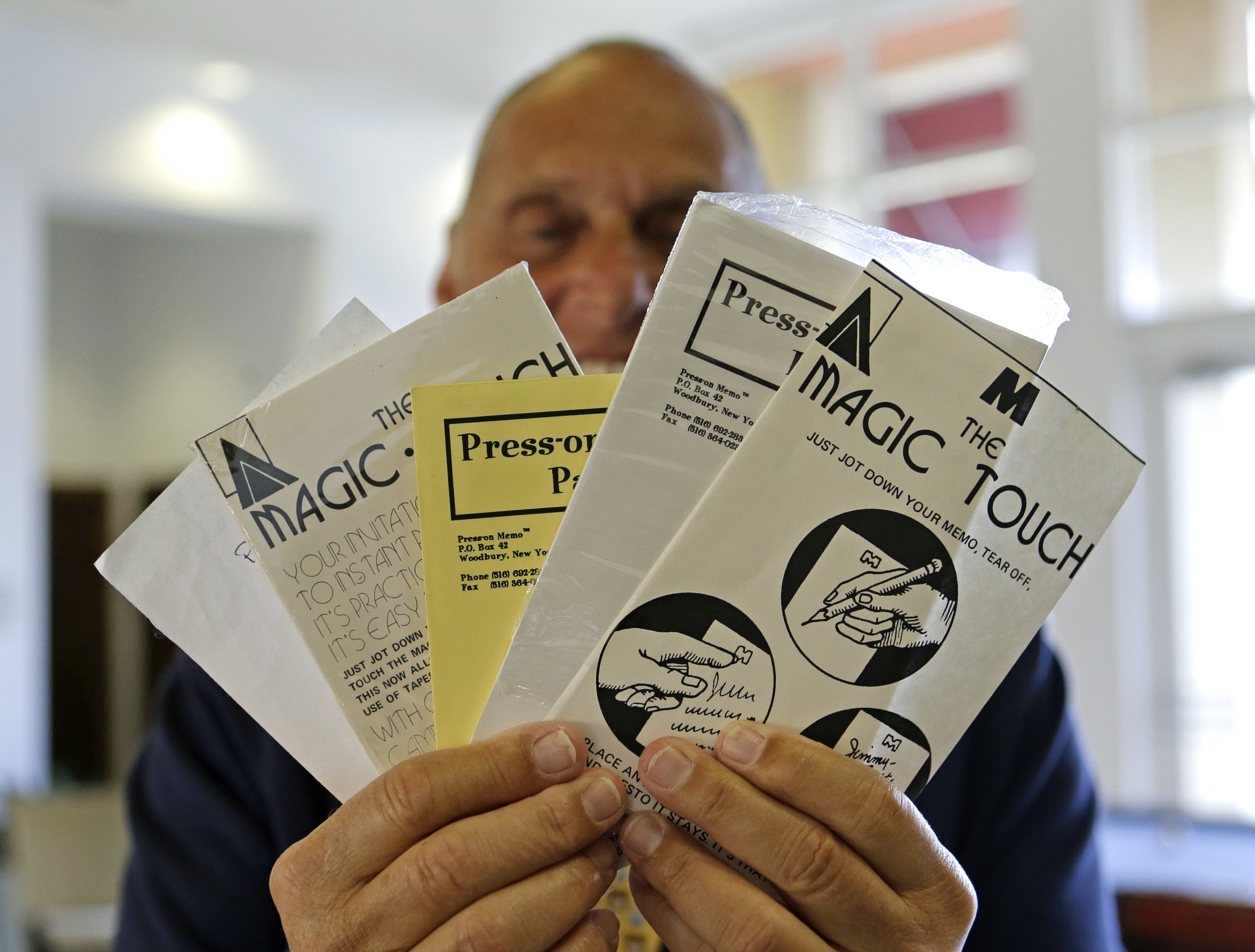 In this photo taken Monday, March 7, 2016, Alan Amron shows his inventions in West Palm Beach, Fla. Amron is suing 3M Company in a South Florida federal court in a dispute over who invented the ubiquitous Post-it Note. (Photo: AP Photo/Alan Diaz)