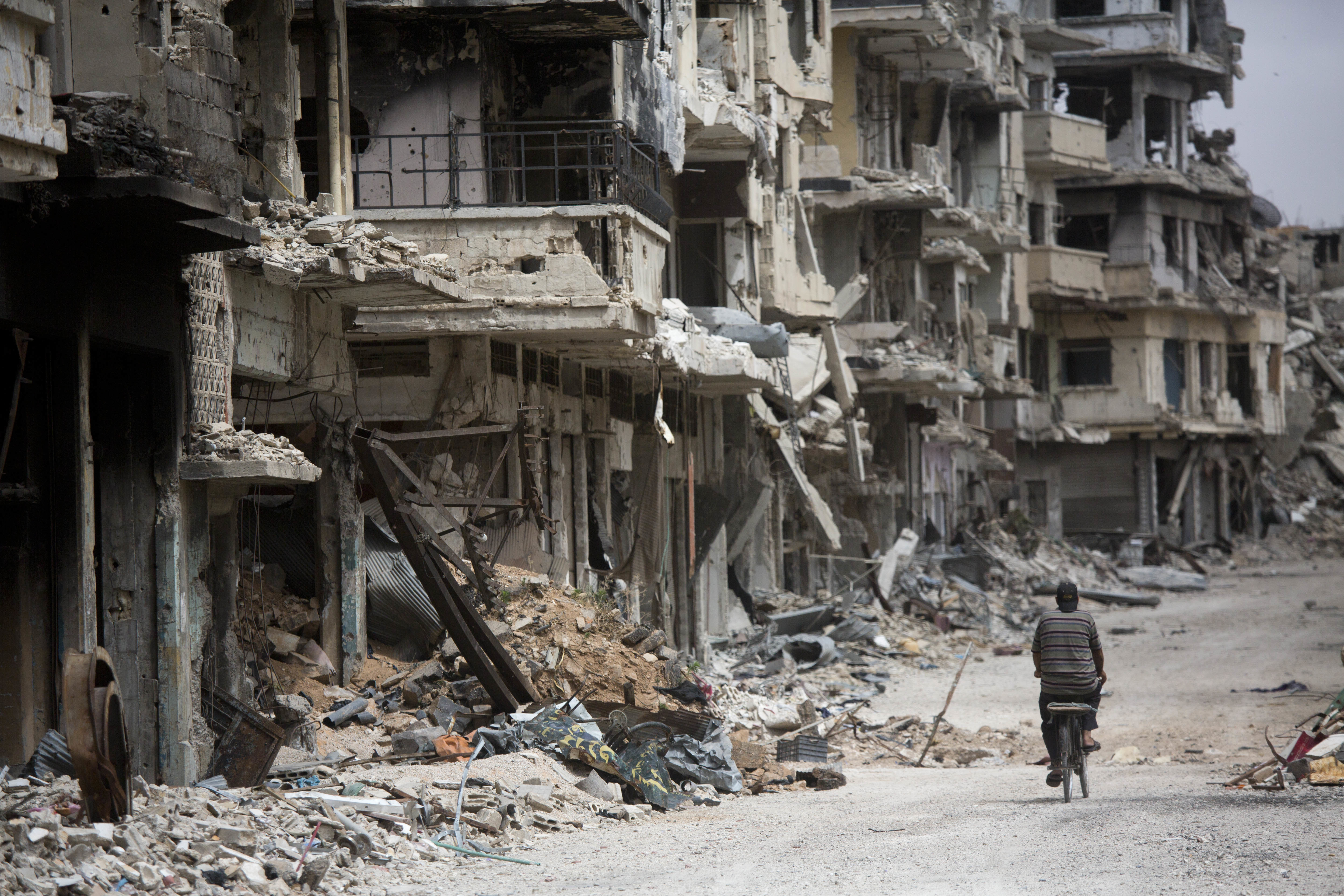 The Latest: Hollande wants tougher Europe role in Syria