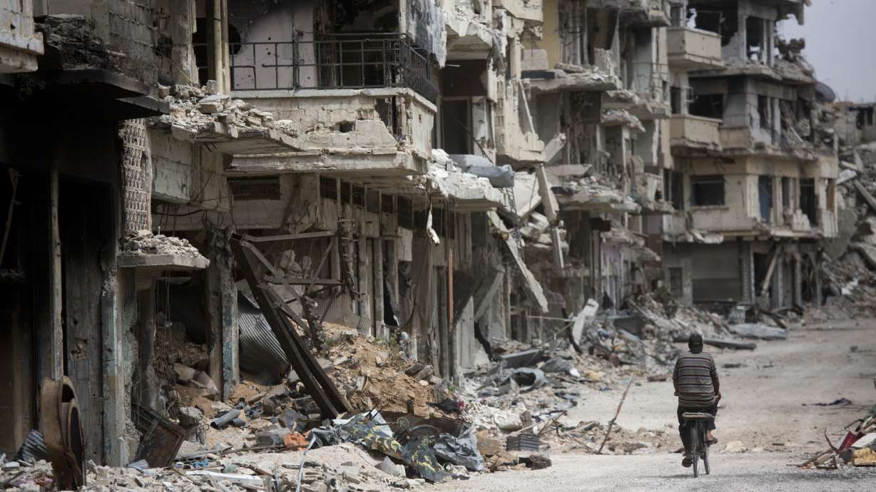 The Latest: Hollande wants tougher Europe role in Syria