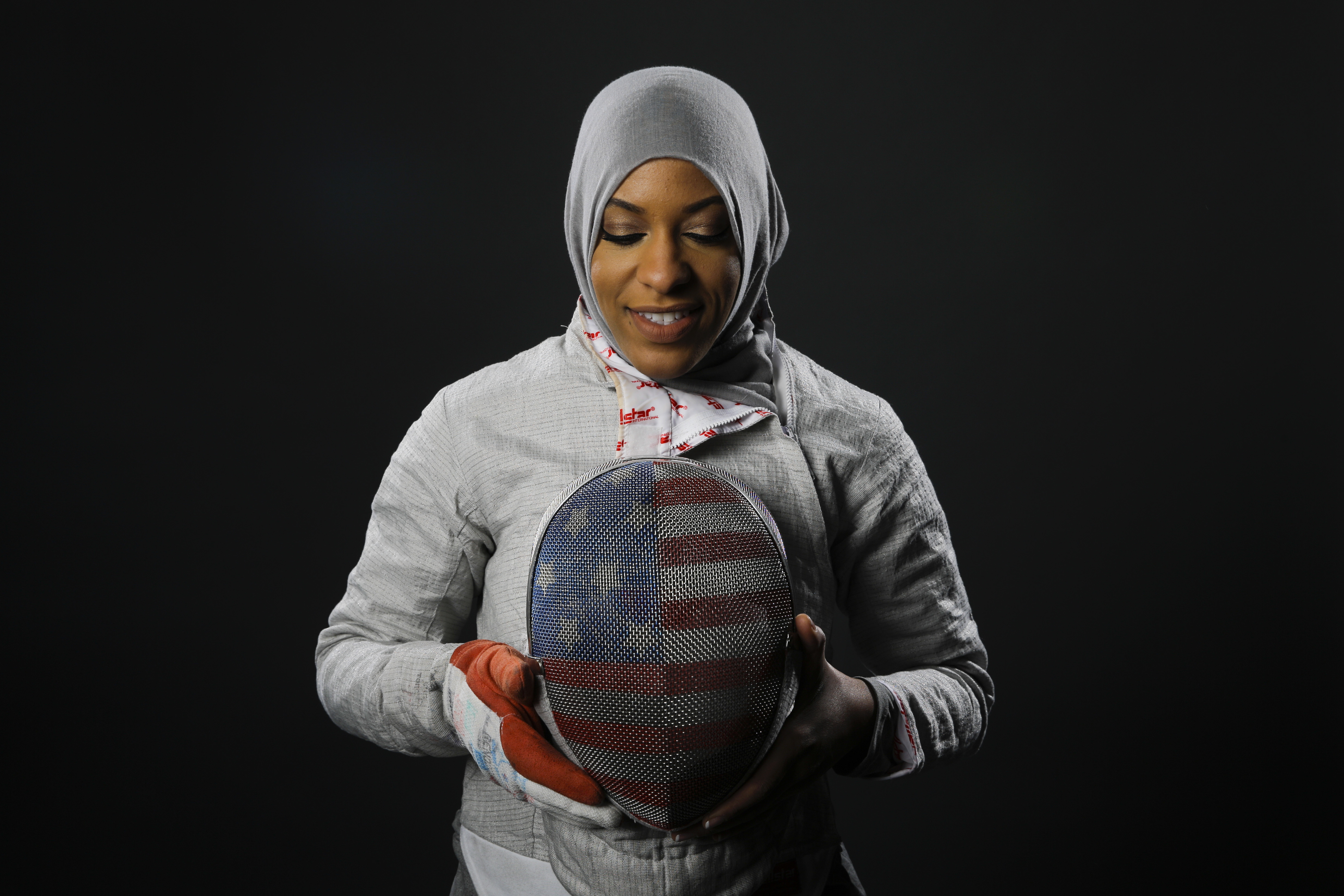 Fencer Ibtihaj Muhammad poses for photos at the 2016 Olympic Team USA media summit in Beverly Hills, Calif. Photo: AP Photo