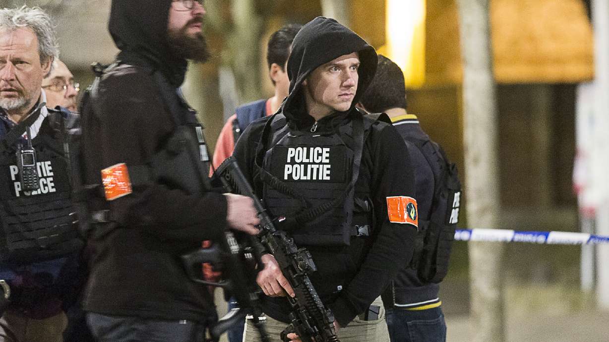 Hunt on for 2 in Belgian raid linked to Paris attacks