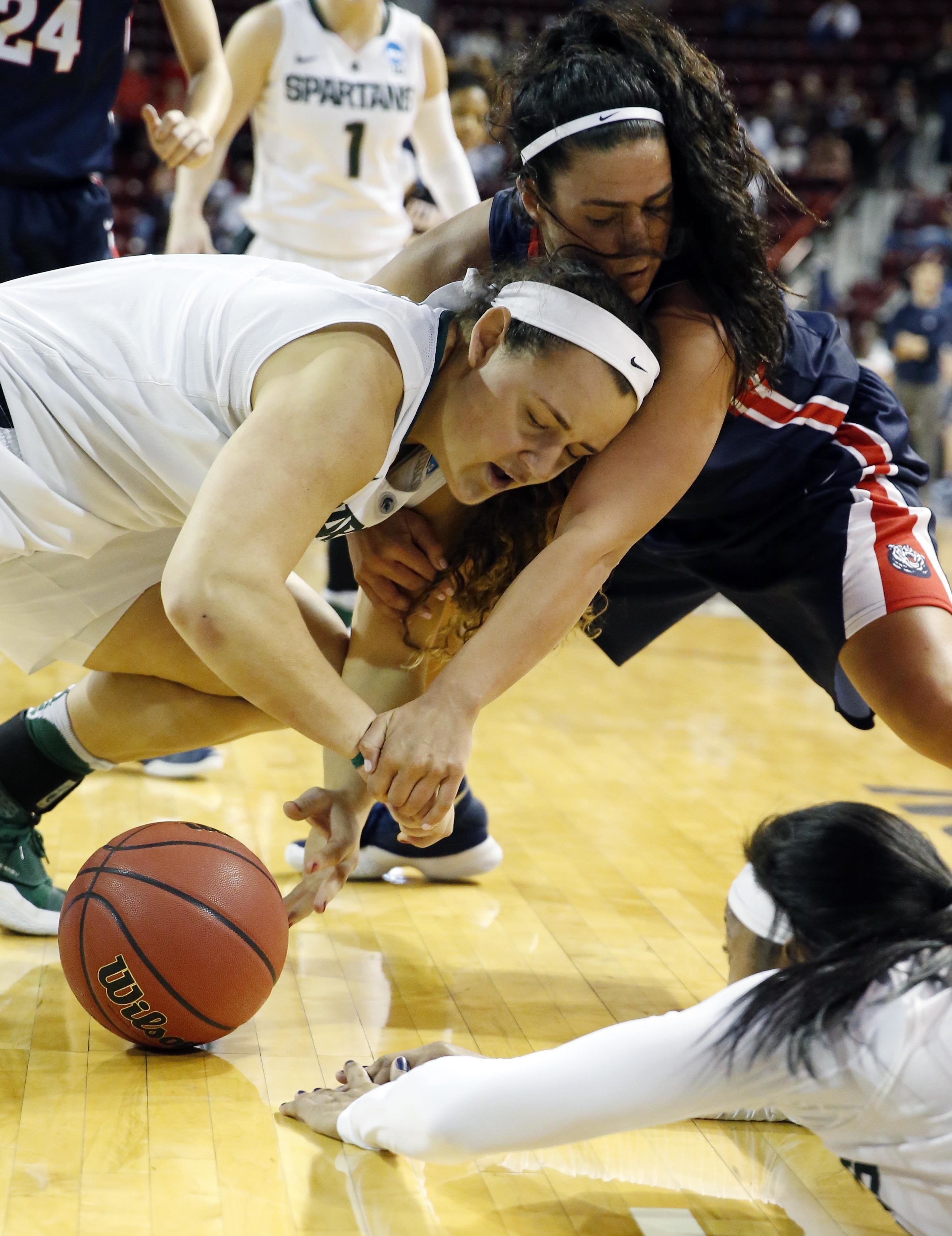 Michigan State pulls away to beat Belmont 74-60