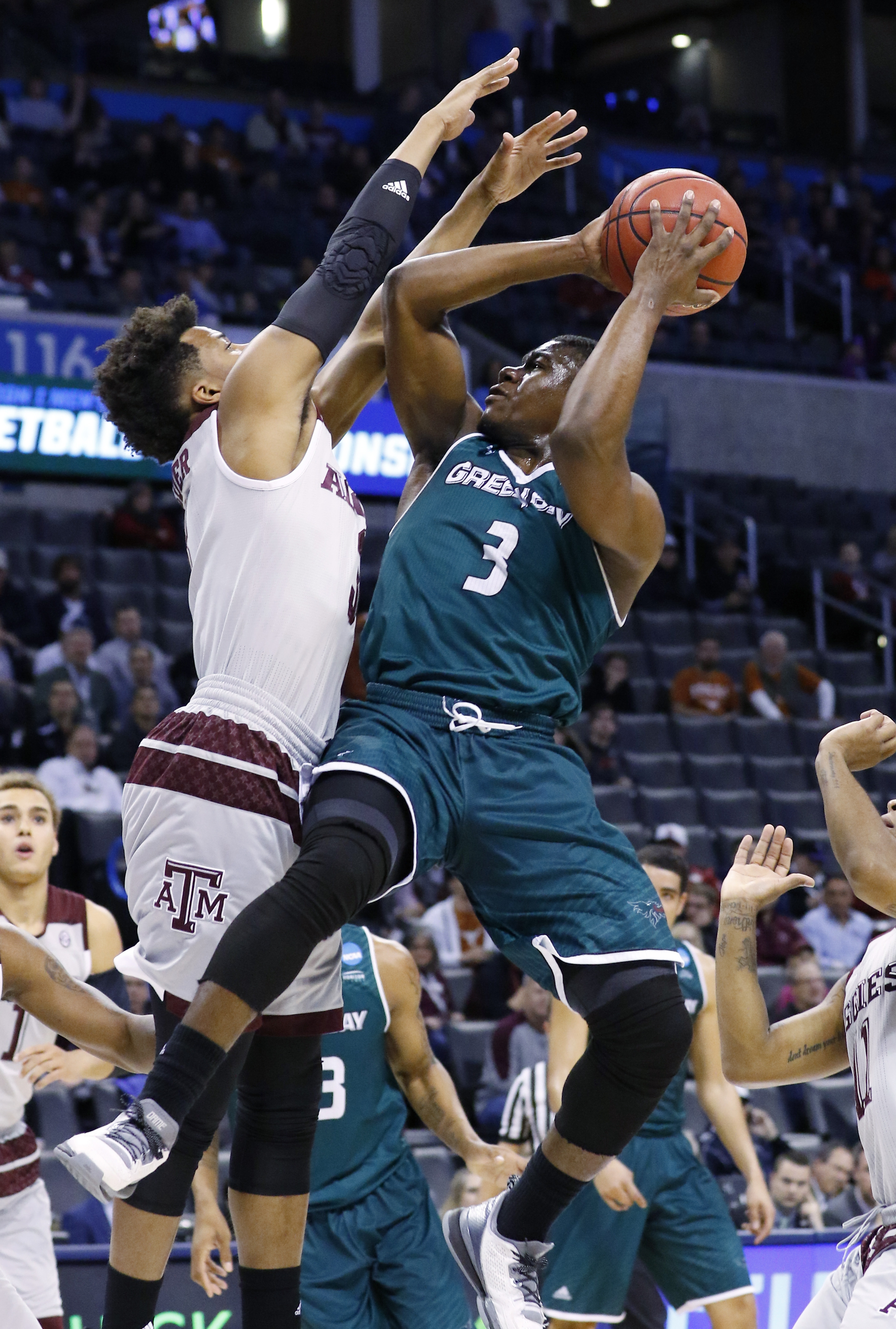 House leads Texas A&M to opening 92-65 win over Green Bay