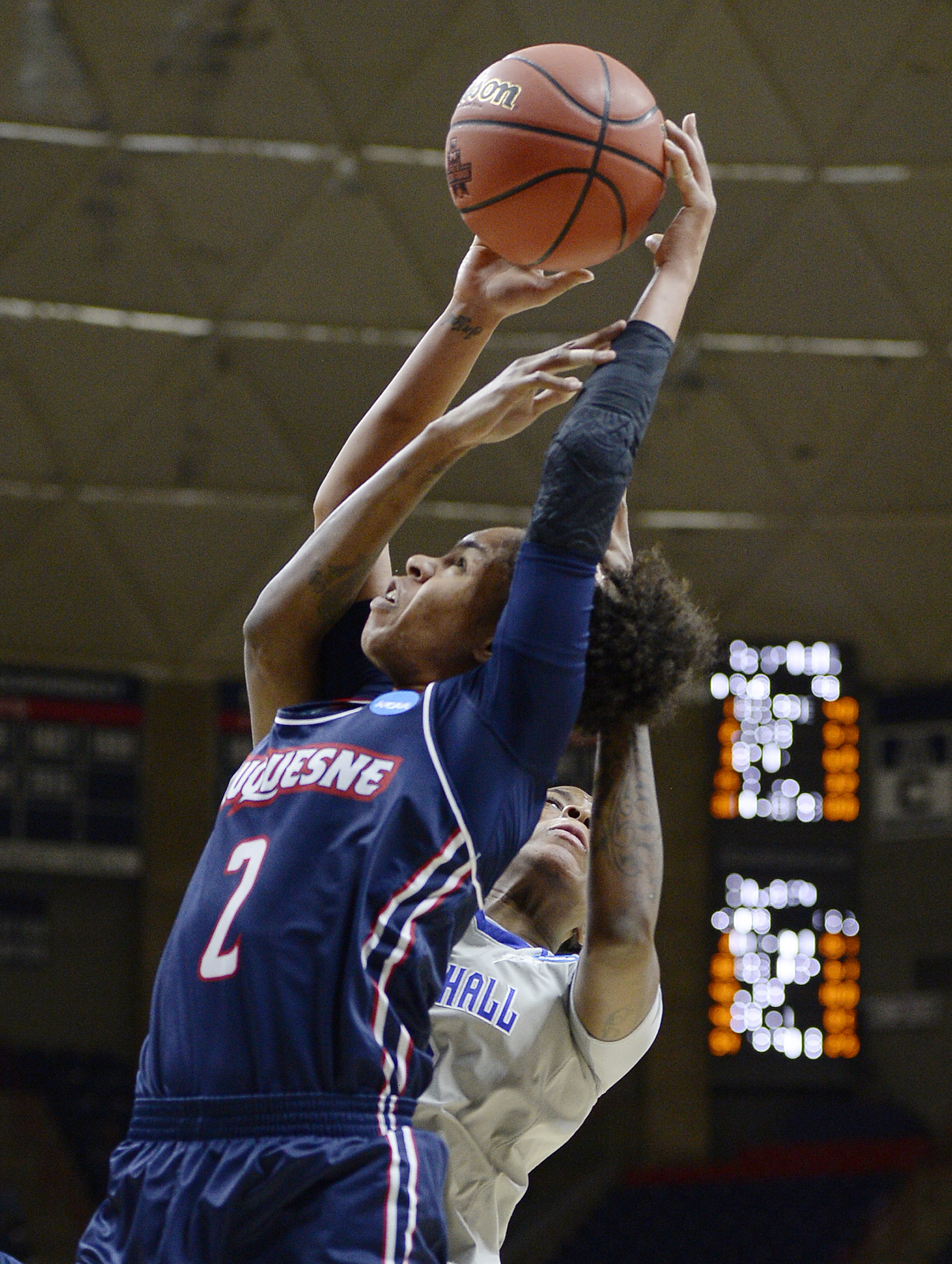 Duquesne beats Seton Hall 97-76 in NCAA tournament debut