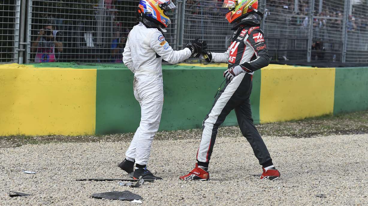 Alonso flips car after dramatic collision at Australian GP