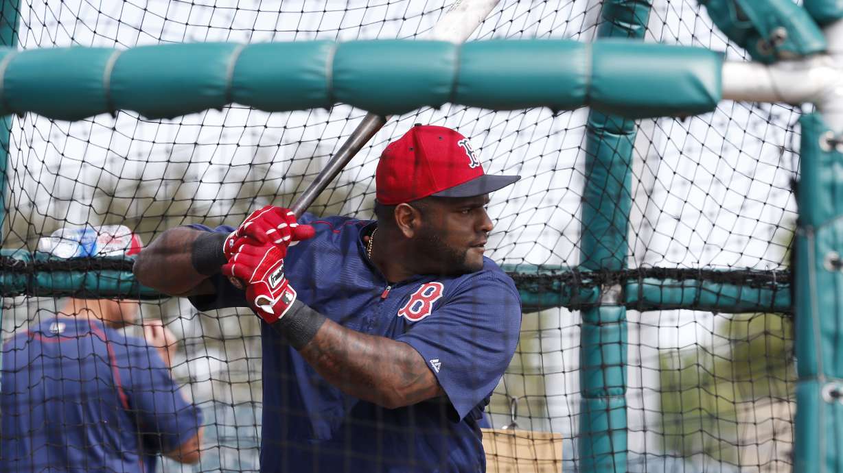 Sandoval has injured back and is out of Red Sox lineup