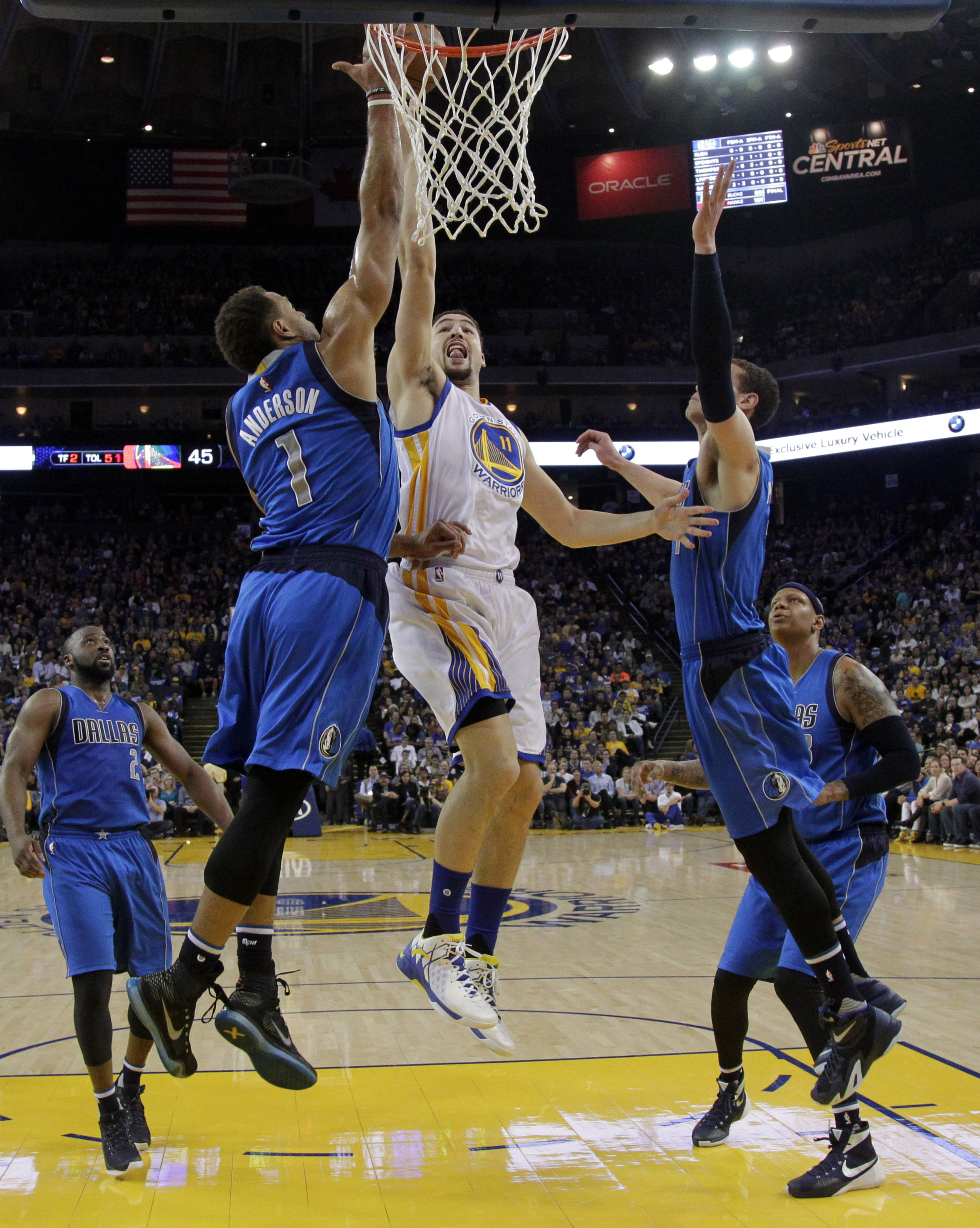 Warriors make 21 3-pointers, beat Mavs for 65th win
