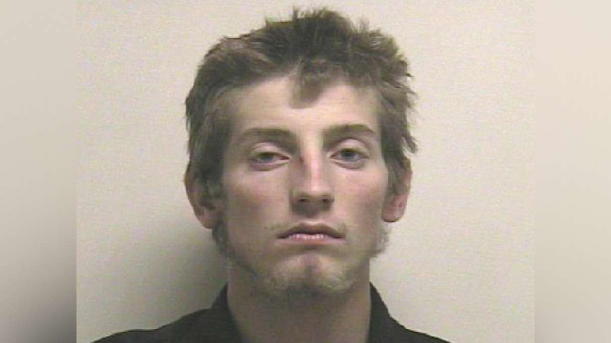 Police searching for man suspected of trying to run down police officers with car