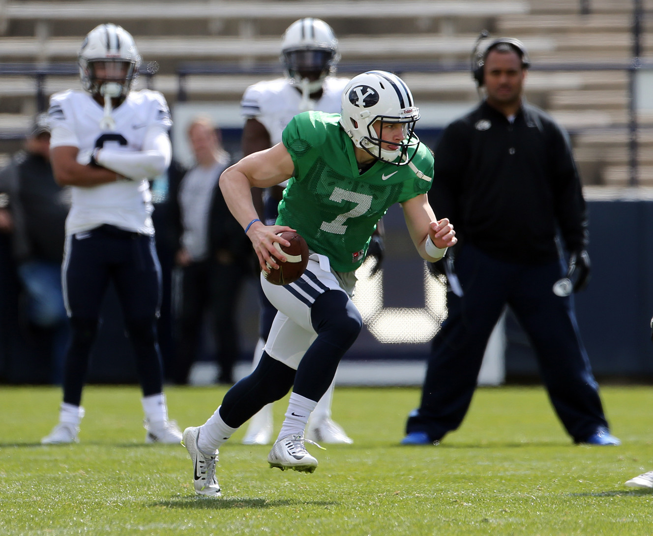BYU quarterback Beau Hoge (7) scrambles for a run during a spring football scrimmage at LaVell Edwards Stadium in Provo, Saturday, March 26, 2016. (Photo: Chris Samuels, Deseret News)