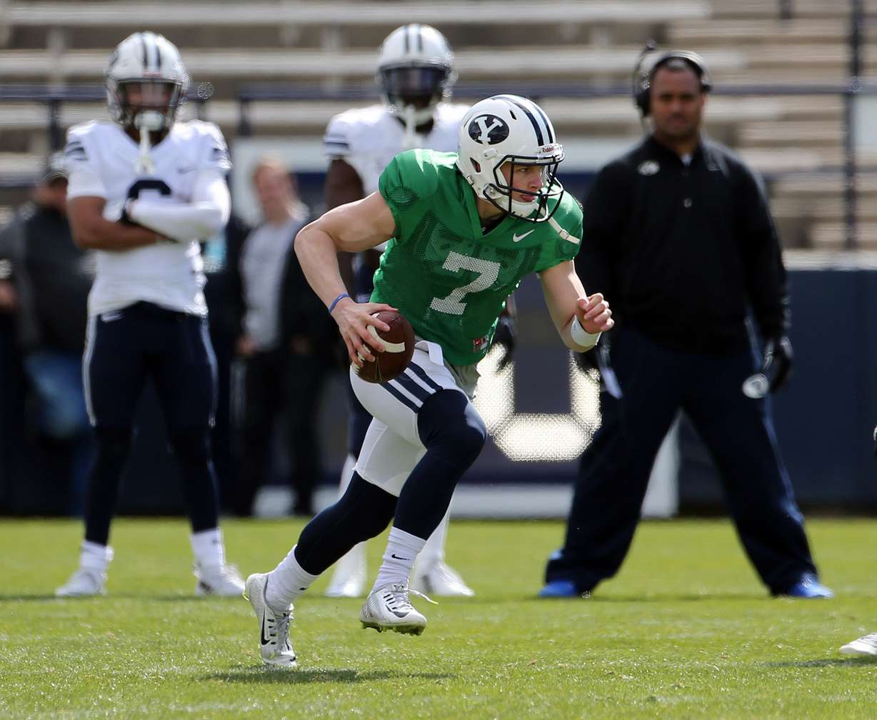 BYU quarterback Beau Hoge (7) scrambles for a run during a spring football scrimmage at LaVell Edwards Stadium in Provo, Saturday, March 26, 2016. (Photo: Chris Samuels, Deseret News)