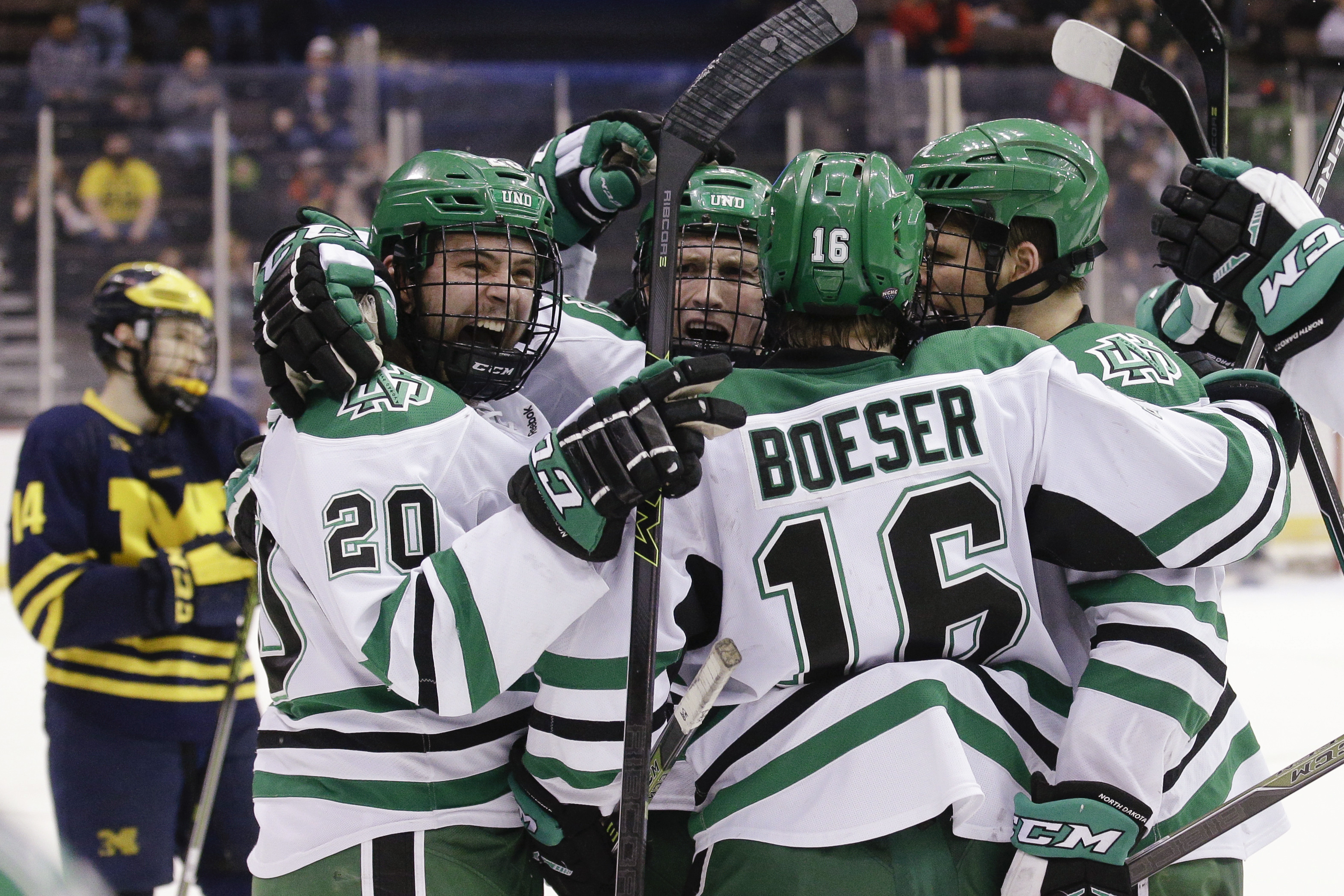 North Dakota beats Michigan 5-2 to reach Frozen Four.