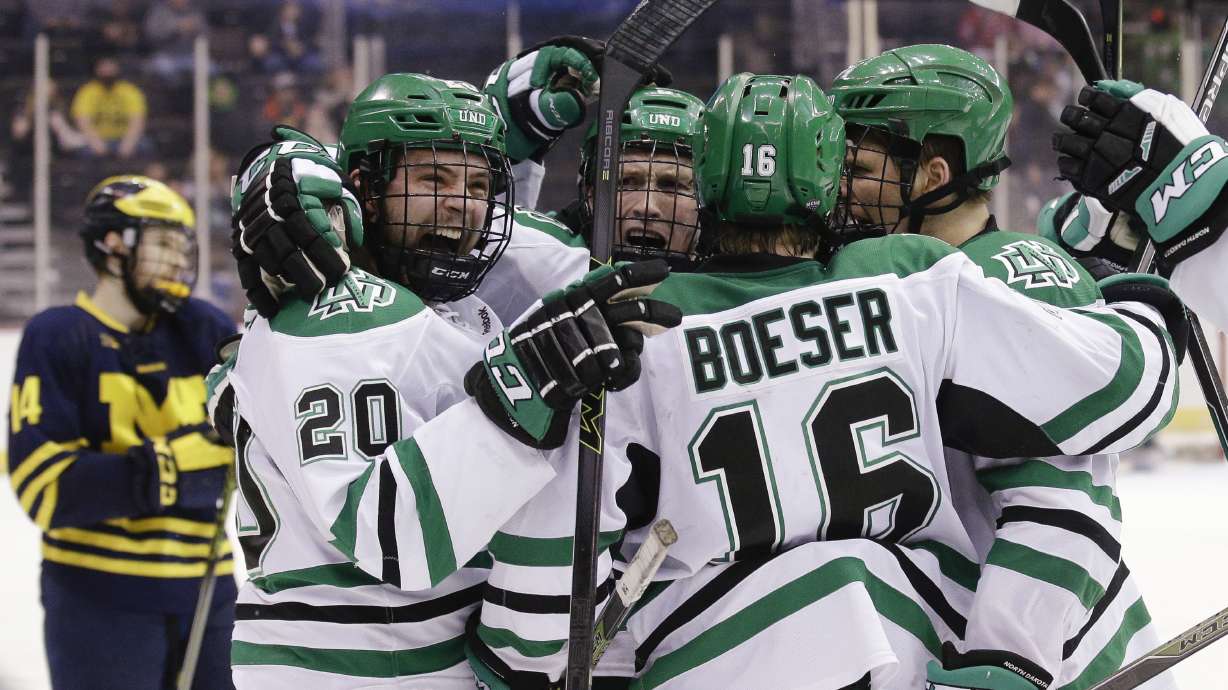 North Dakota beats Michigan 5-2 to reach Frozen Four.