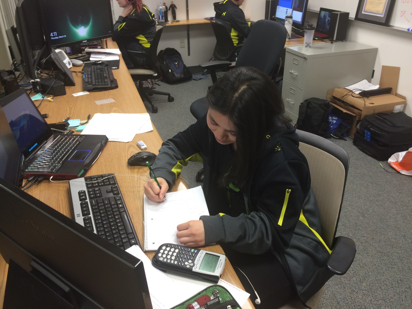 Cara Cornell working on a project in the BYU cybersecurity lab. (Photo: Carrie Rogers-Whitehead)