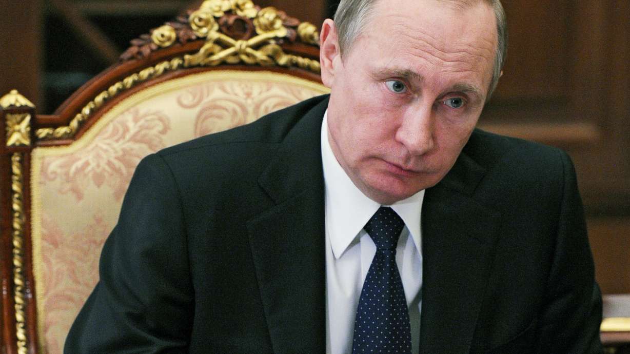 Russian athletes appeal to Putin over coach banned for life