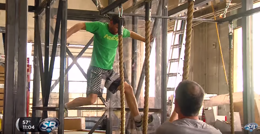 Crossfit enthusiast Tony Donato attempts an "American Ninja Warrior" inspired gym that will debut April 29 at FitCon 2016 at the South Towne Expo Center. (Photo: Jeremiah Jensen, KSL-TV)
