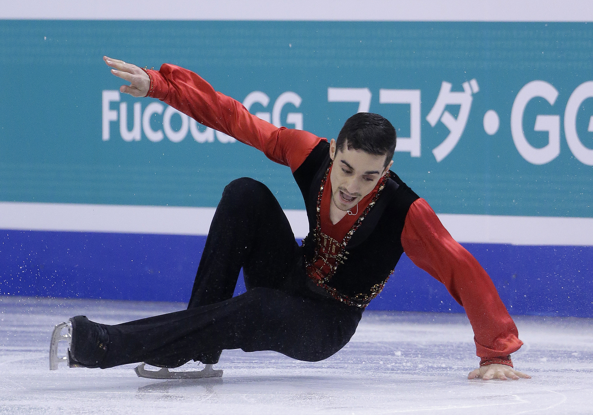 Japan's Hanyu leads after flawless short program at worlds