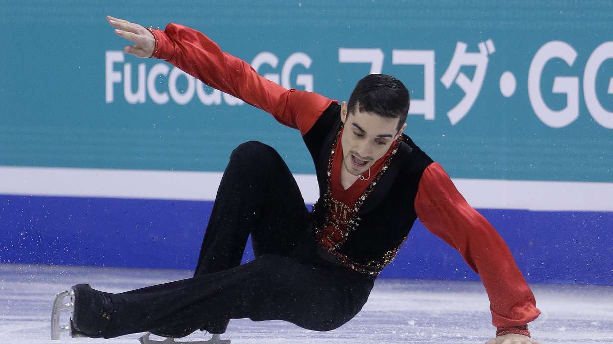 Japan's Hanyu leads after flawless short program at worlds