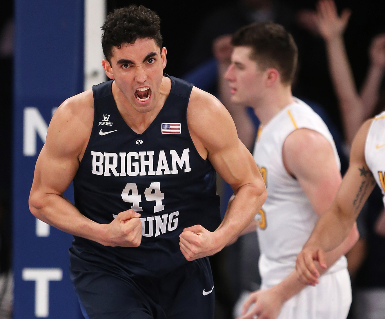 BYU center Corbin Kaufusi (44) reacts after battling for a rebound and shot as BYU and Valparaiso play in NIT Semifinal action at Madison Square Garden in New York City. BYU lost 70-72 Tuesday, March 29, 2016. (Photo: Scott G Winterton, Deseret News)