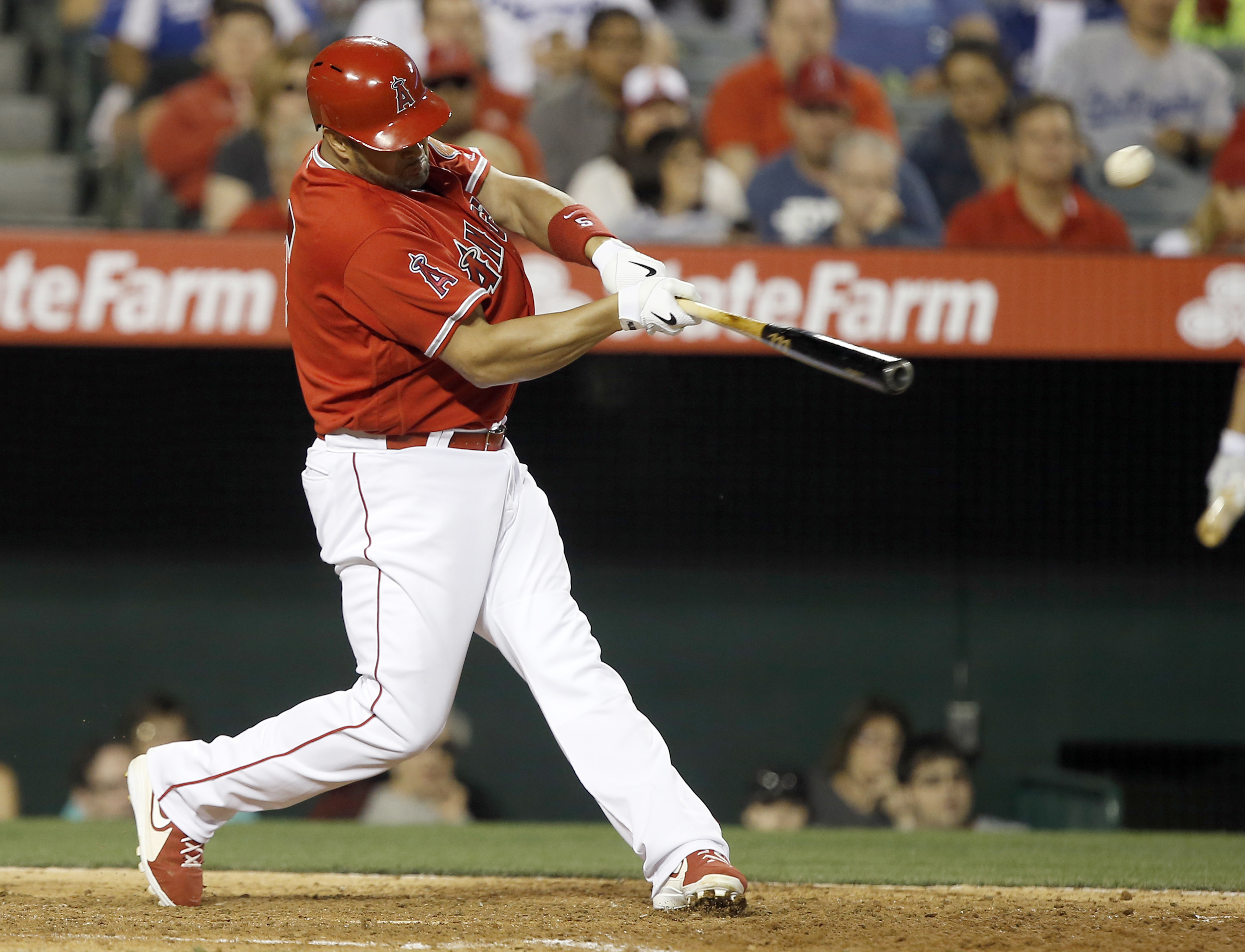 Pujols homers, Trout hits 3-run double as Angels top Dodgers