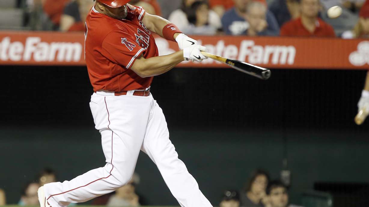 Pujols homers, Trout hits 3-run double as Angels top Dodgers