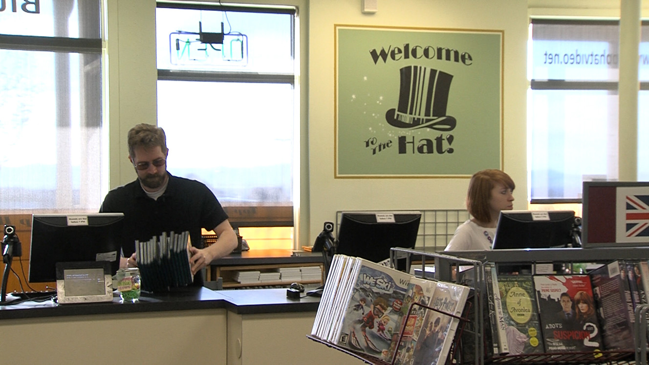 Employees working at Top Hat Video, at 521 W. 2600 South in Bountiful. The business announced Tuesday it is closing its doors in December — after nearly 40 years in business.