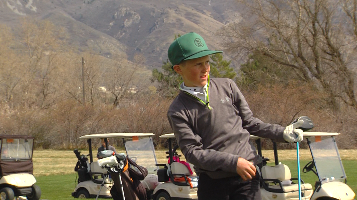 Highland's Cooper Jones drives an informal competition with close friend Aadyn Long. The two were invited to the annual Drive, Chip and Putt competition at Augusta National Golf Club. (Photo: Ben Schroeder, KSL-TV)