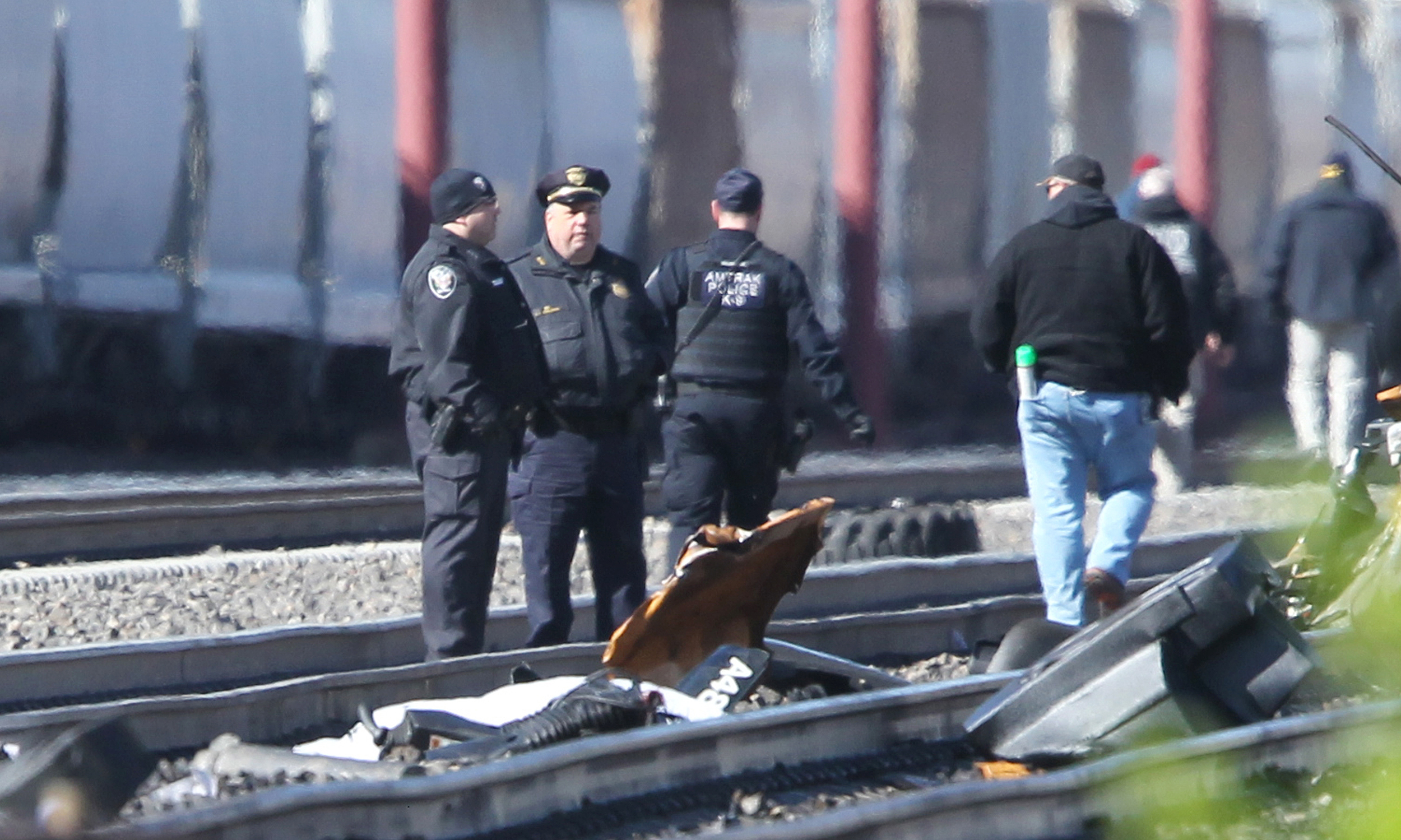Amtrak train struck backhoe at 106 mph; 2 killed on track