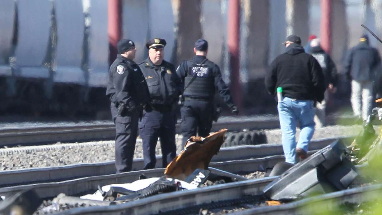 Amtrak train struck backhoe at 106 mph; 2 killed on track