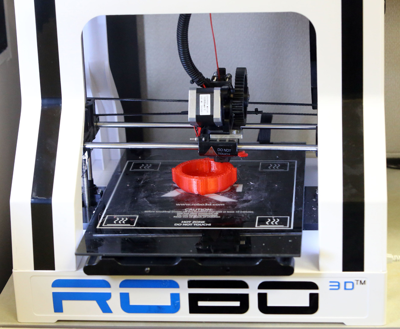 A 3-D printer makes a shower head at Weber State University in Ogden on Monday, April 4, 2016. (Photo: Kristin Murphy, Deseret News)