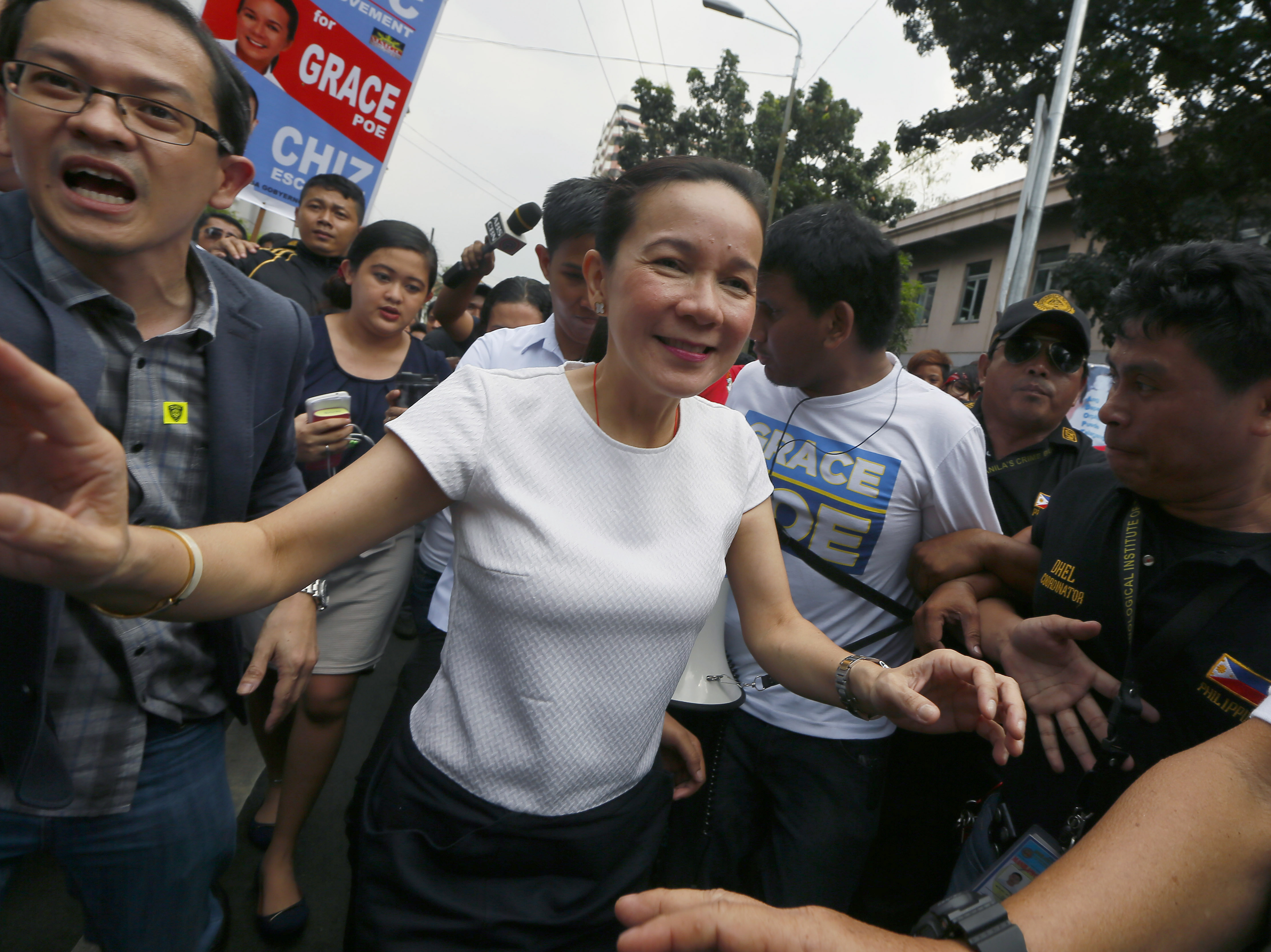 Life story, movie star father lift Poe in Philippines' race