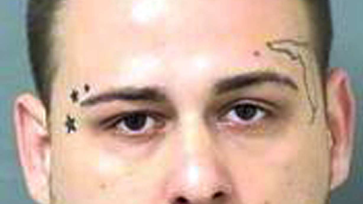 Florida man with Florida tattoo charged with burglary