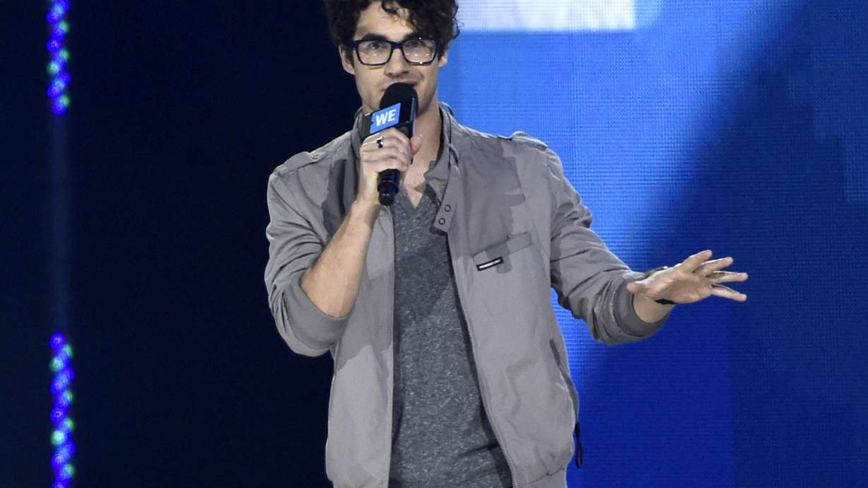 Theron, Rogen inspire schoolkids at first California WE Day