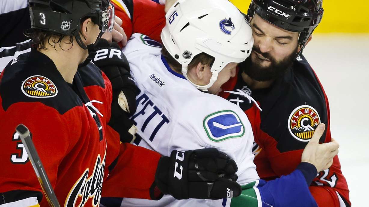 Mikael Backlund has first hat trick, Flames beat Canucks 7-3