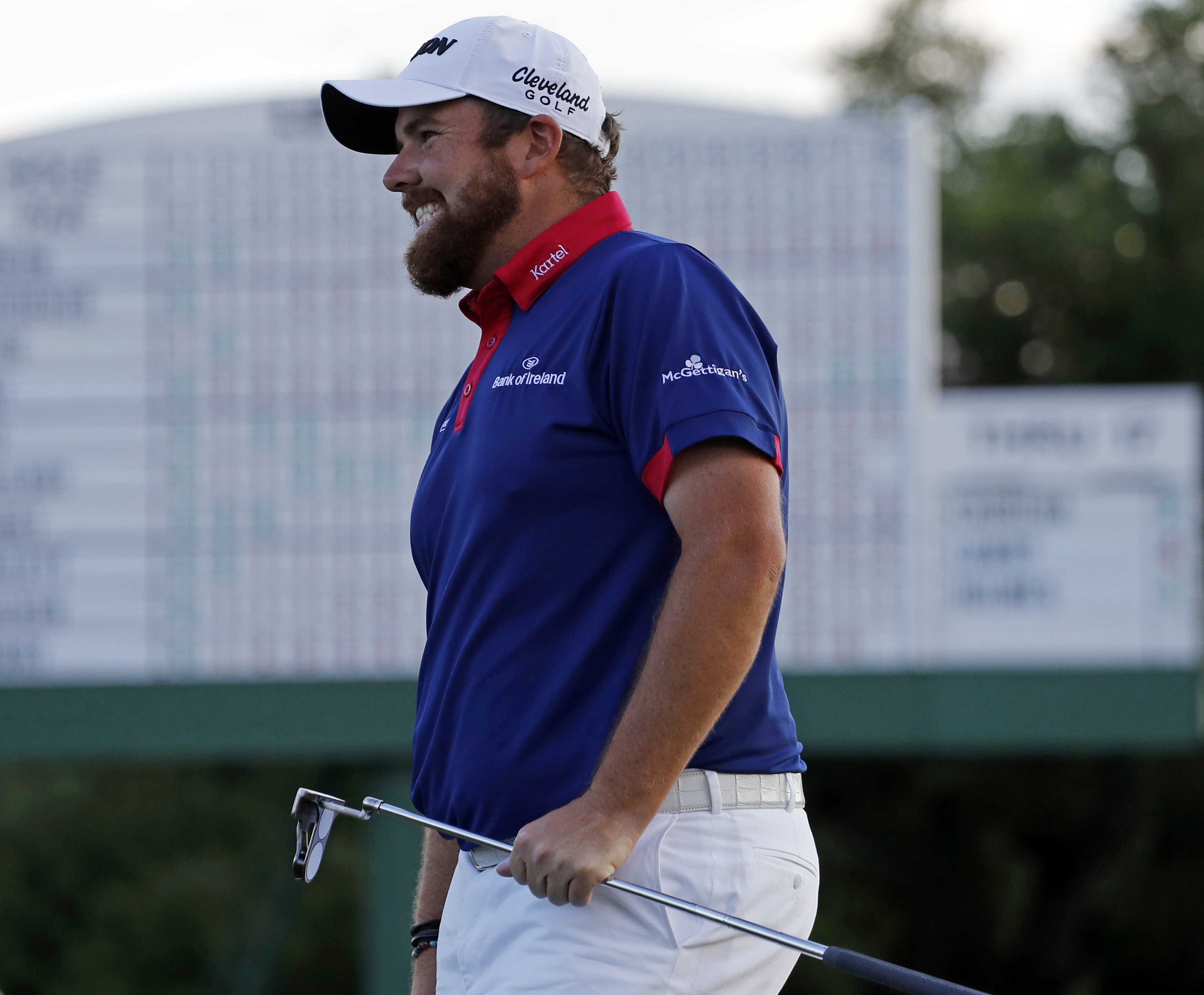 The Latest: Tears, frustration cap blustery day at Masters