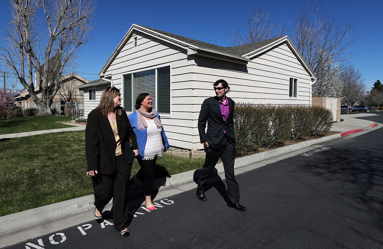 Mina Koplin, program manager of Salt Lake County Milestone Transitional Living, left, Milestone case manager Cydnie LaCour and Milestone house manager Erik Churcher walk between Milestone residences in Sandy on Wednesday, April 6, 2016. (Photo: Ravell Call, Deseret News)