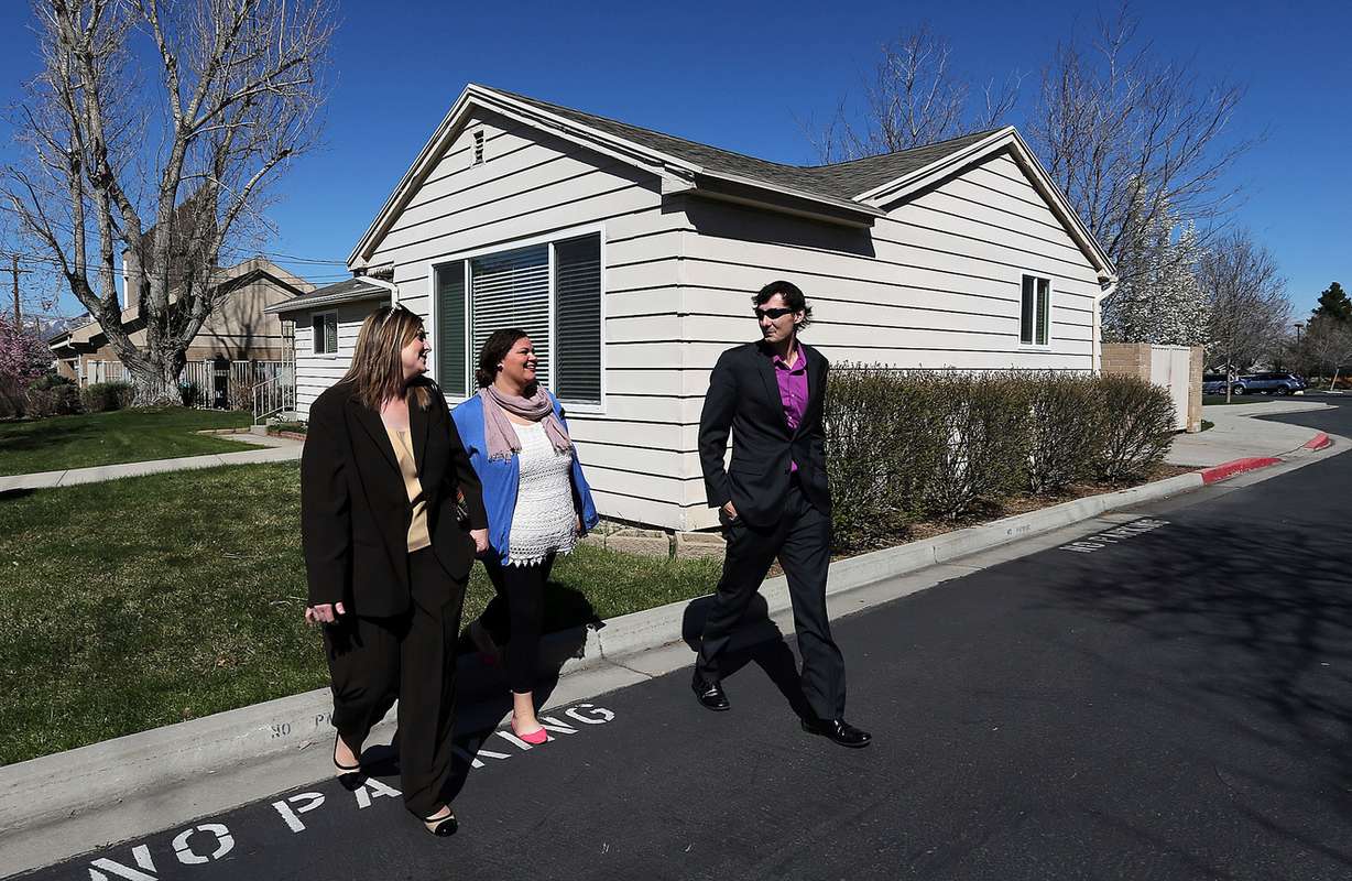 Mina Koplin, program manager of Salt Lake County Milestone Transitional Living, left, Milestone case manager Cydnie LaCour and Milestone house manager Erik Churcher walk between Milestone residences in Sandy on Wednesday, April 6, 2016. (Photo: Ravell Call, Deseret News)