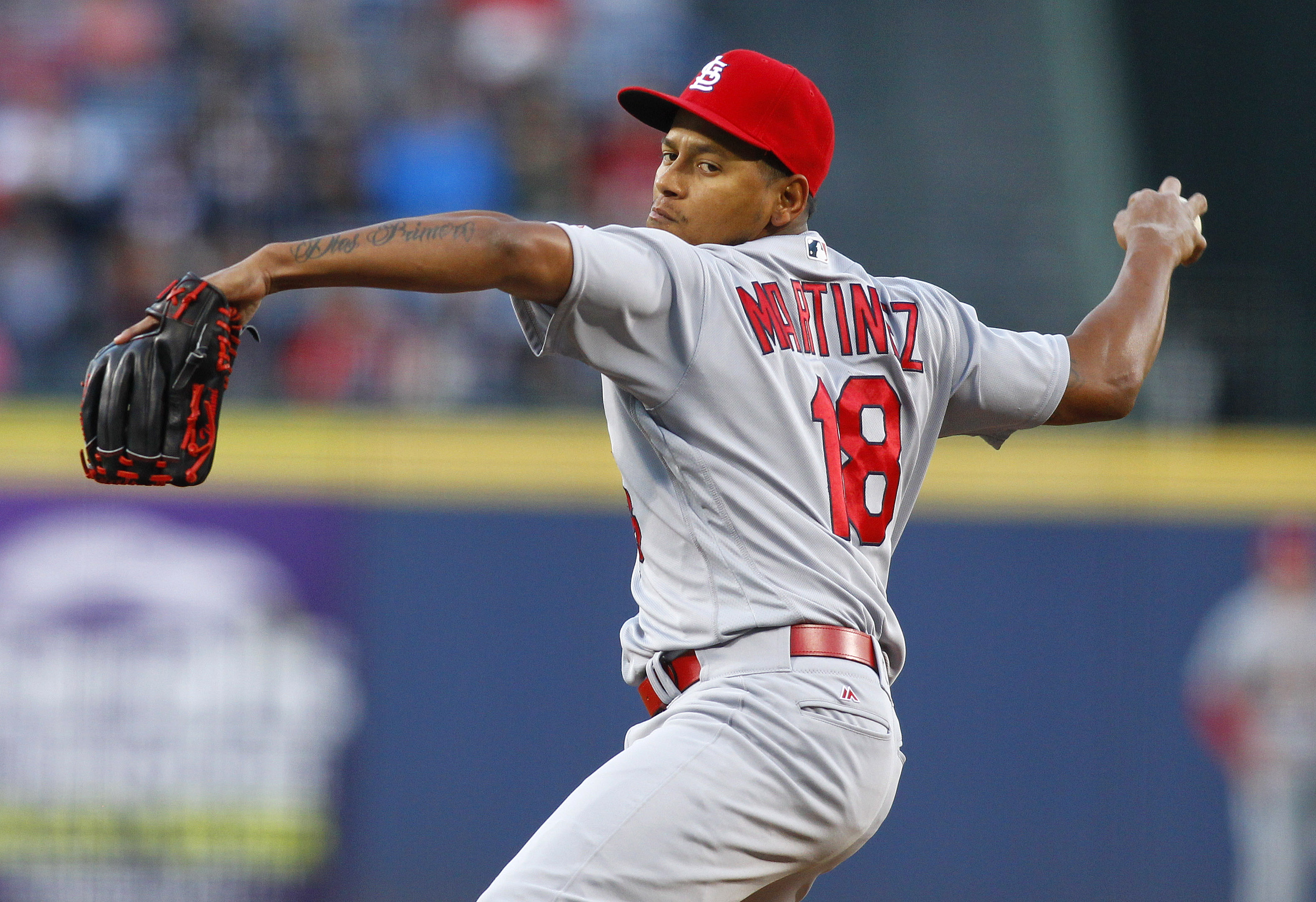 Martinez leads Cardinals to 12-2 win over struggling Braves