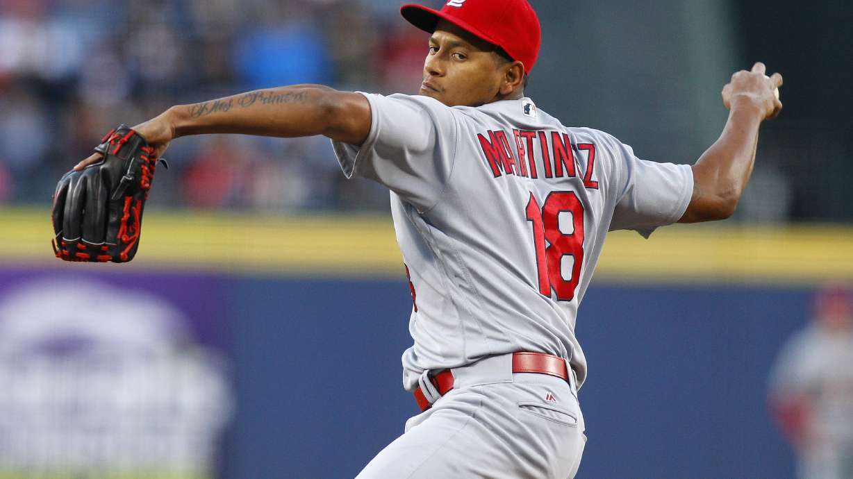 Martinez leads Cardinals to 12-2 win over struggling Braves