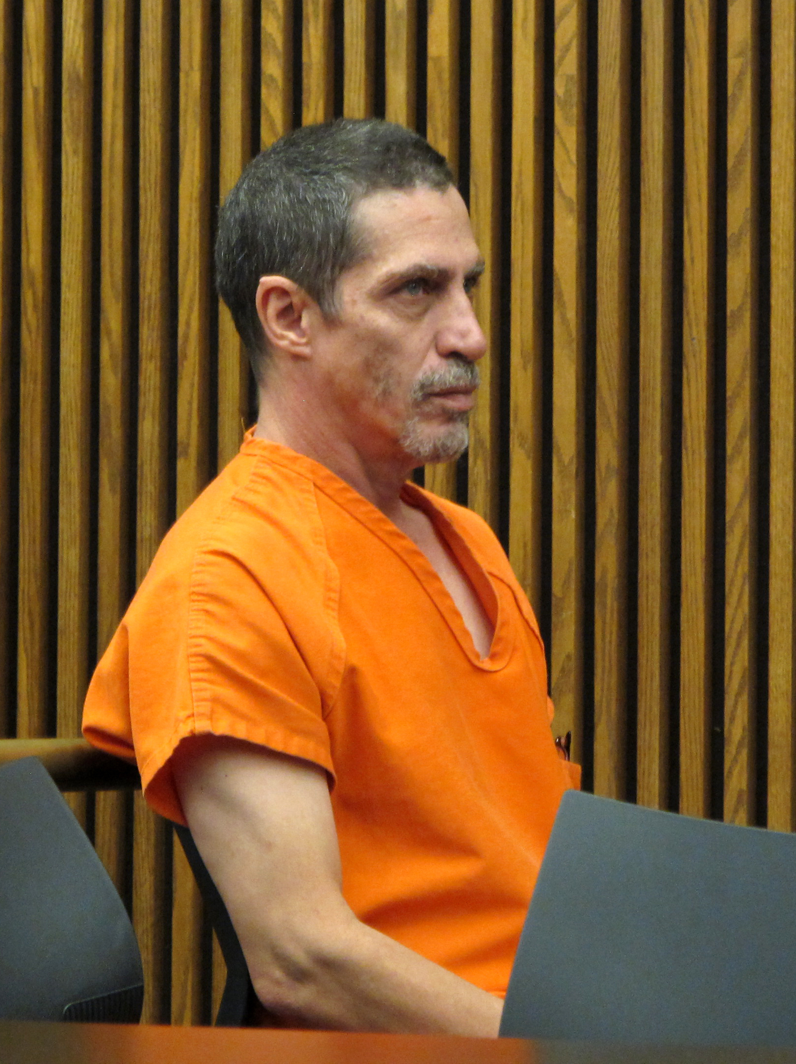 The Latest: Boy taken from mom in 2002 forgives his father