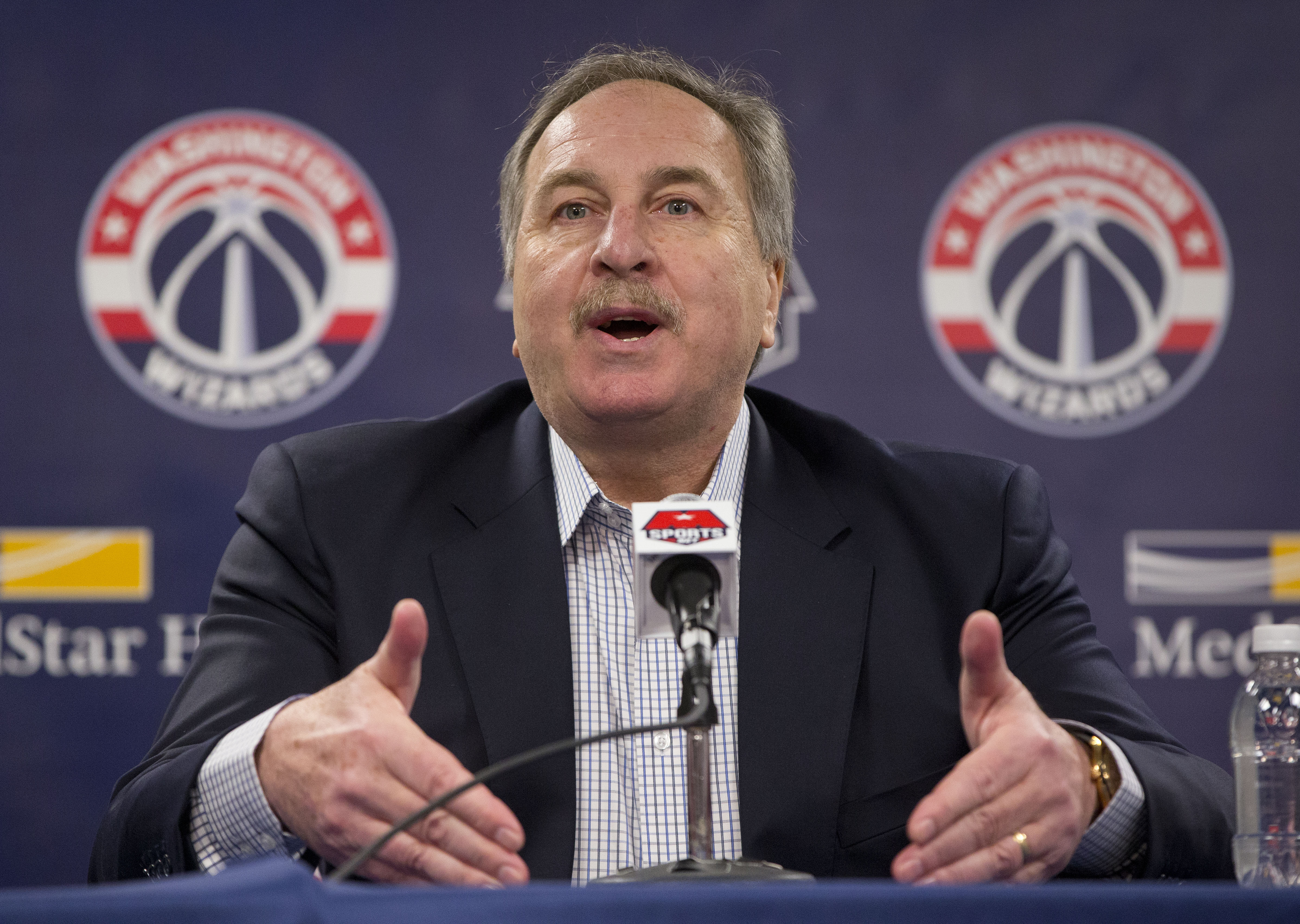 Wizards president Grunfeld stays, fires coach Wittman