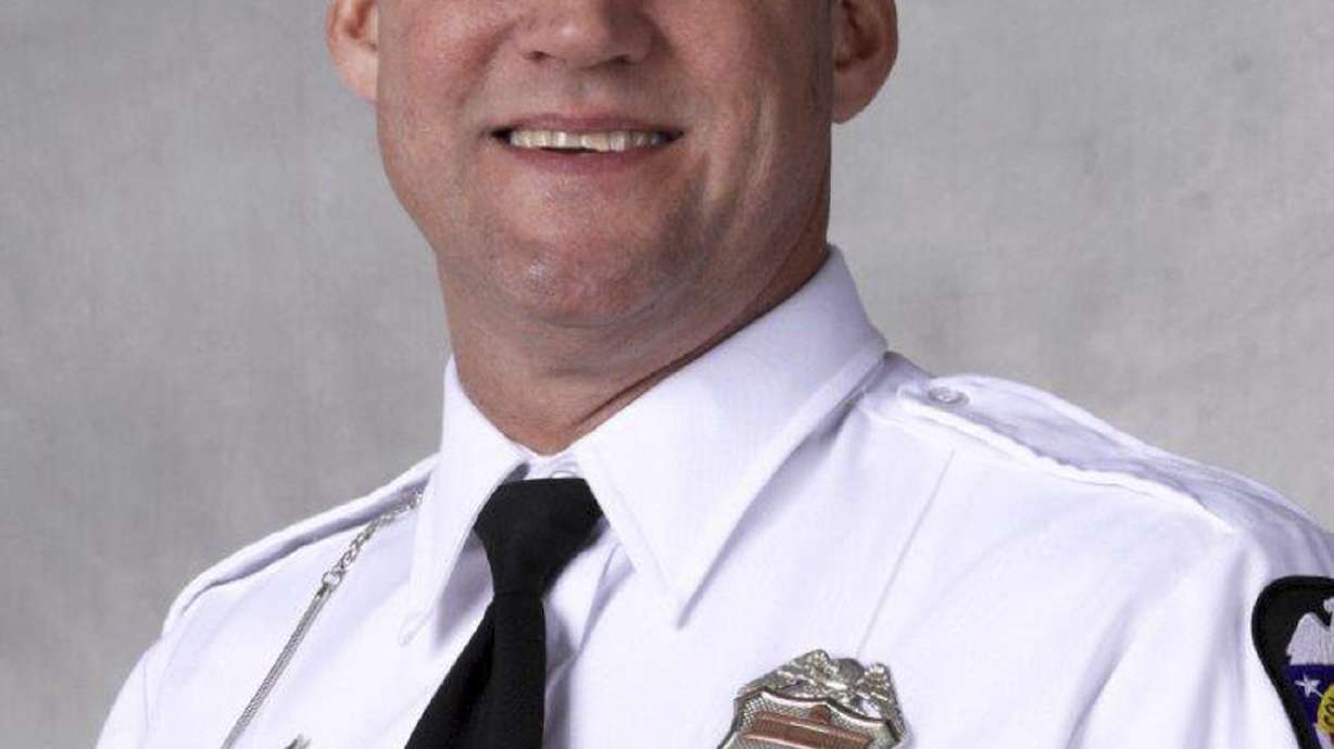 The Latest: Aggravated murder count filed in officer's death