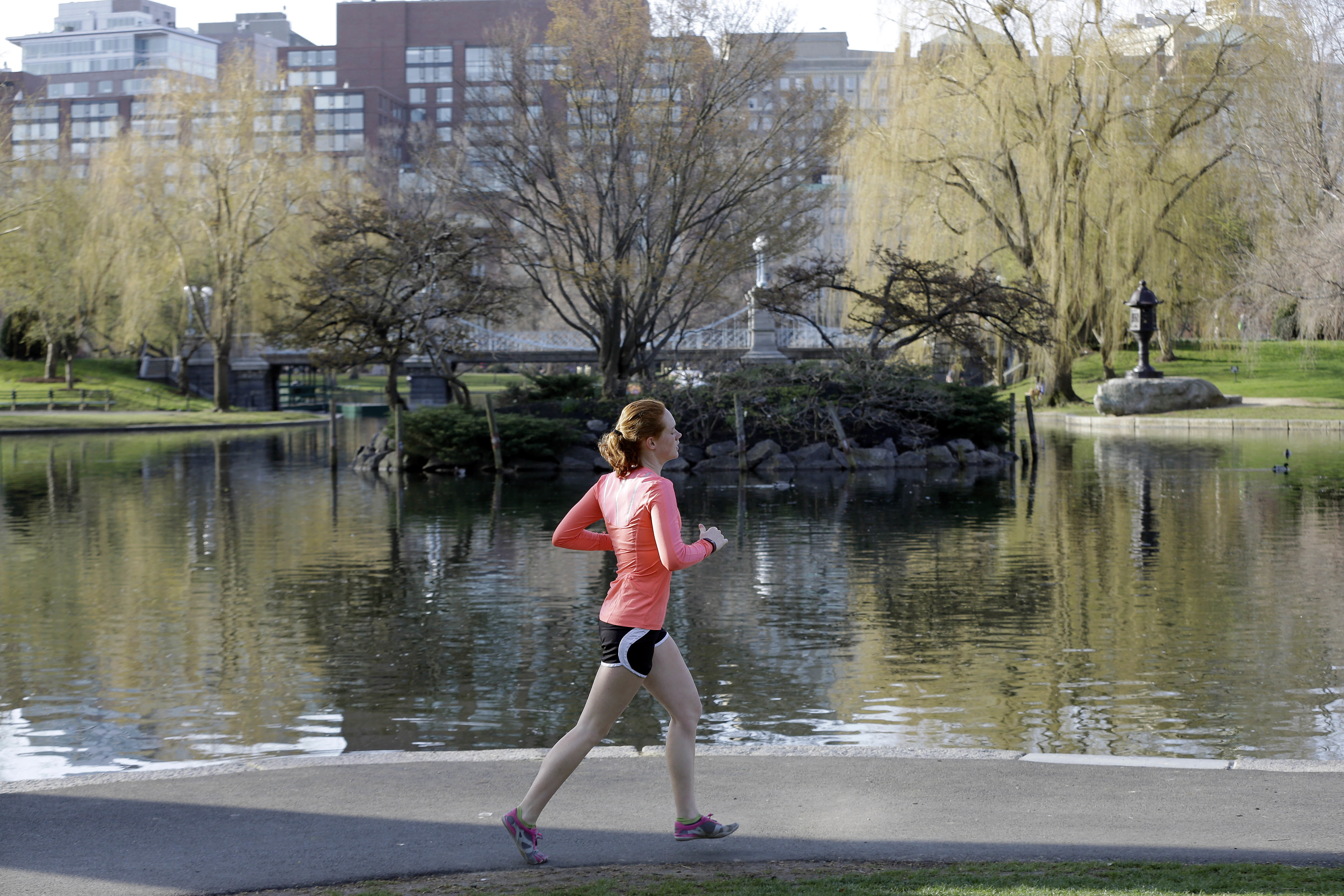 The Latest: Bomb survivor runs marathon on prosthetic blade
